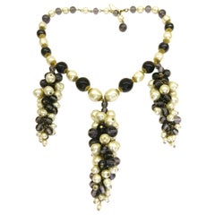 A large baroque pearl and glass bead three grape drop necklace, M Haskell, 1980s