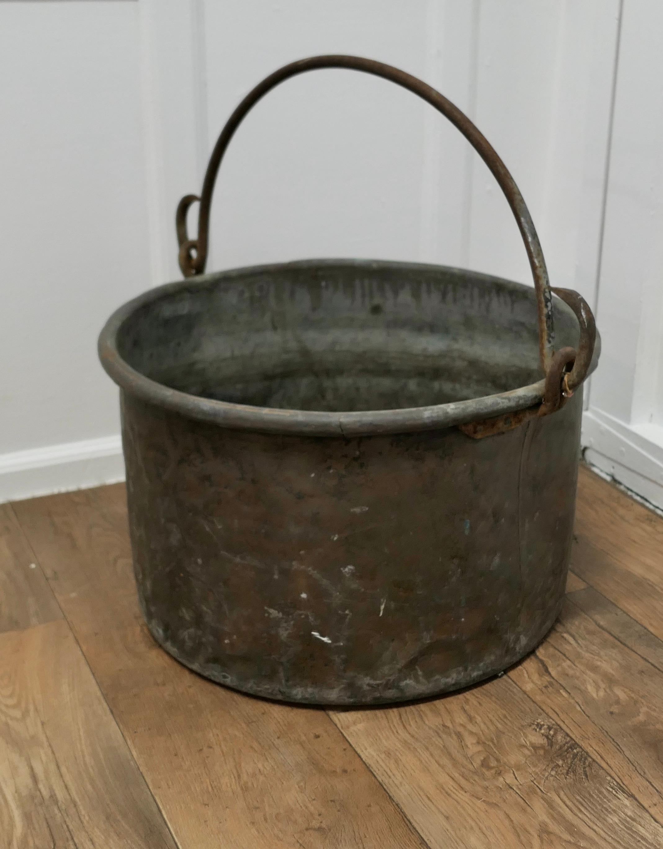 A Large Beaten Brass Log Bin

A lovely piece, the brass has a fully age darkened patina, it is made in the traditional way, beaten in Brass with an Iron Swing handle

The Bucket is 15” tall and 26” in diameter
MS52.