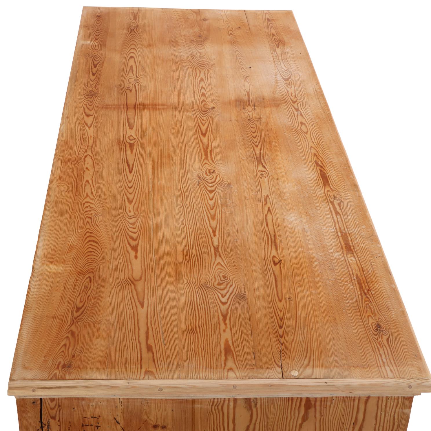 Handsome pine cabinet offering great versatility for today’s interiors. The upper section has 6 blind doors over a lower section with work surface and 4 blind doors. The substantial lower base, likely fitted with drawers at one time, has the perfect