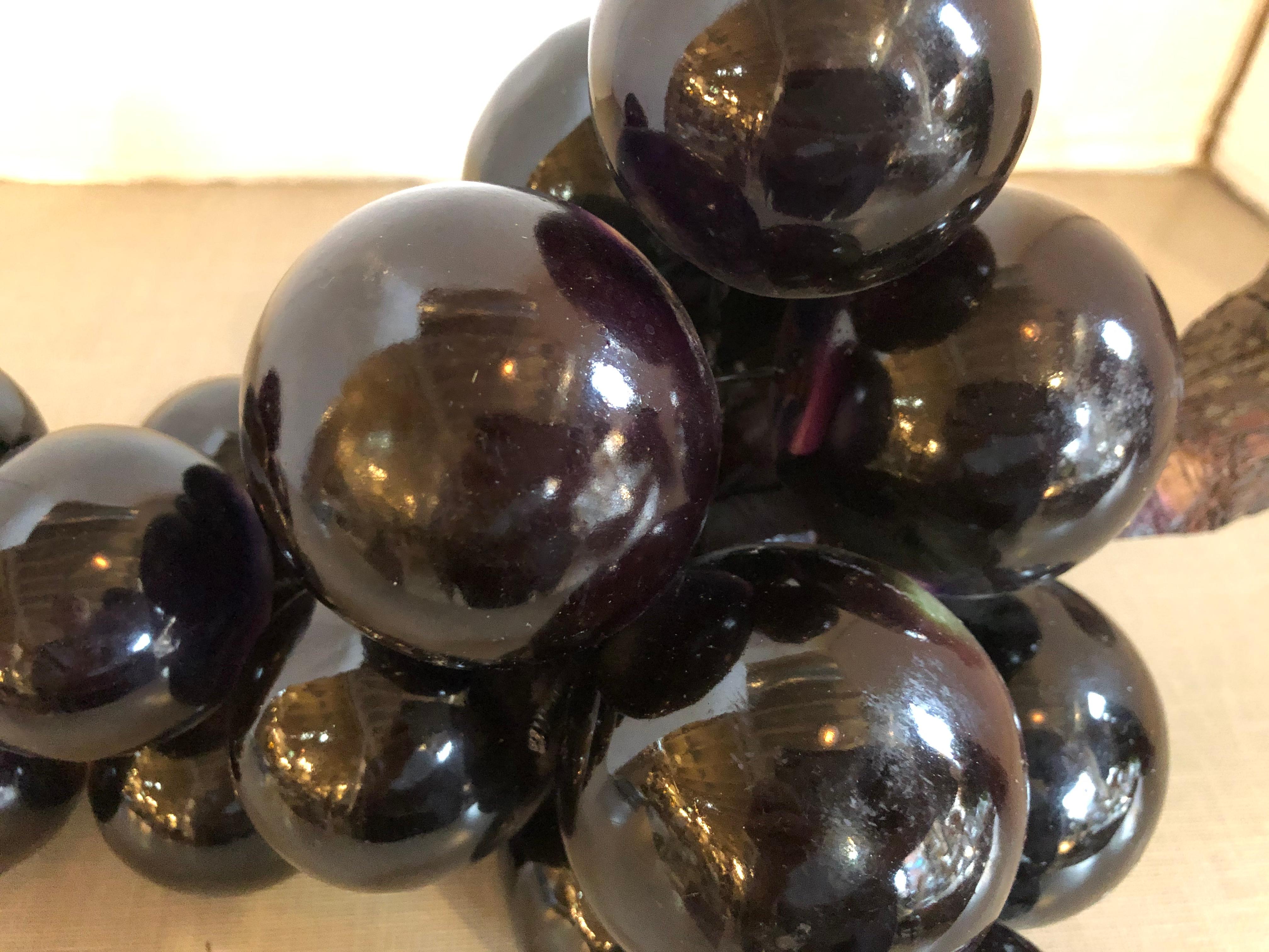 A midcentury black acrylic grape cluster.