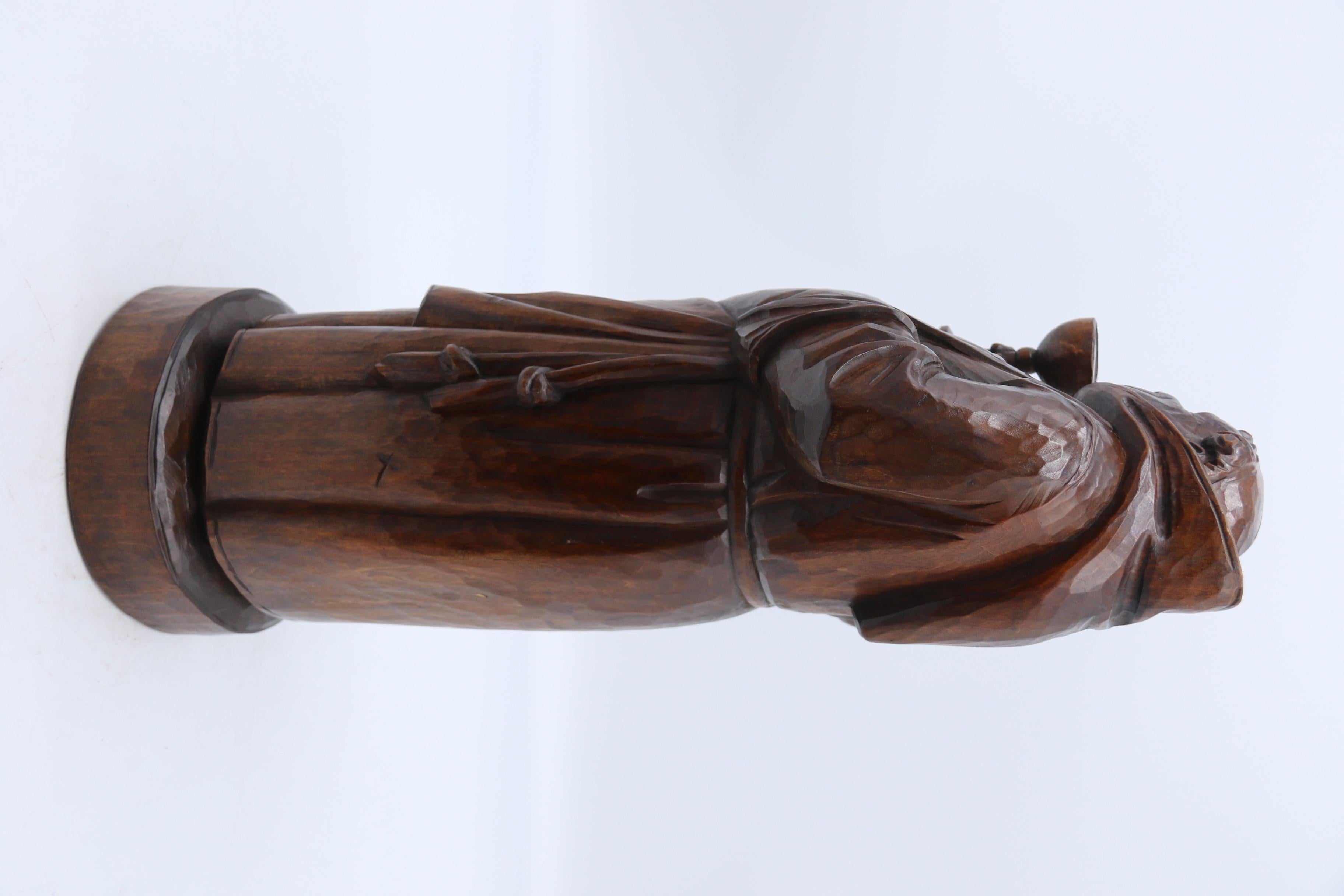 Wood A Large Black Forest carved limewood study of a monk, Swiss, circa 1900 For Sale