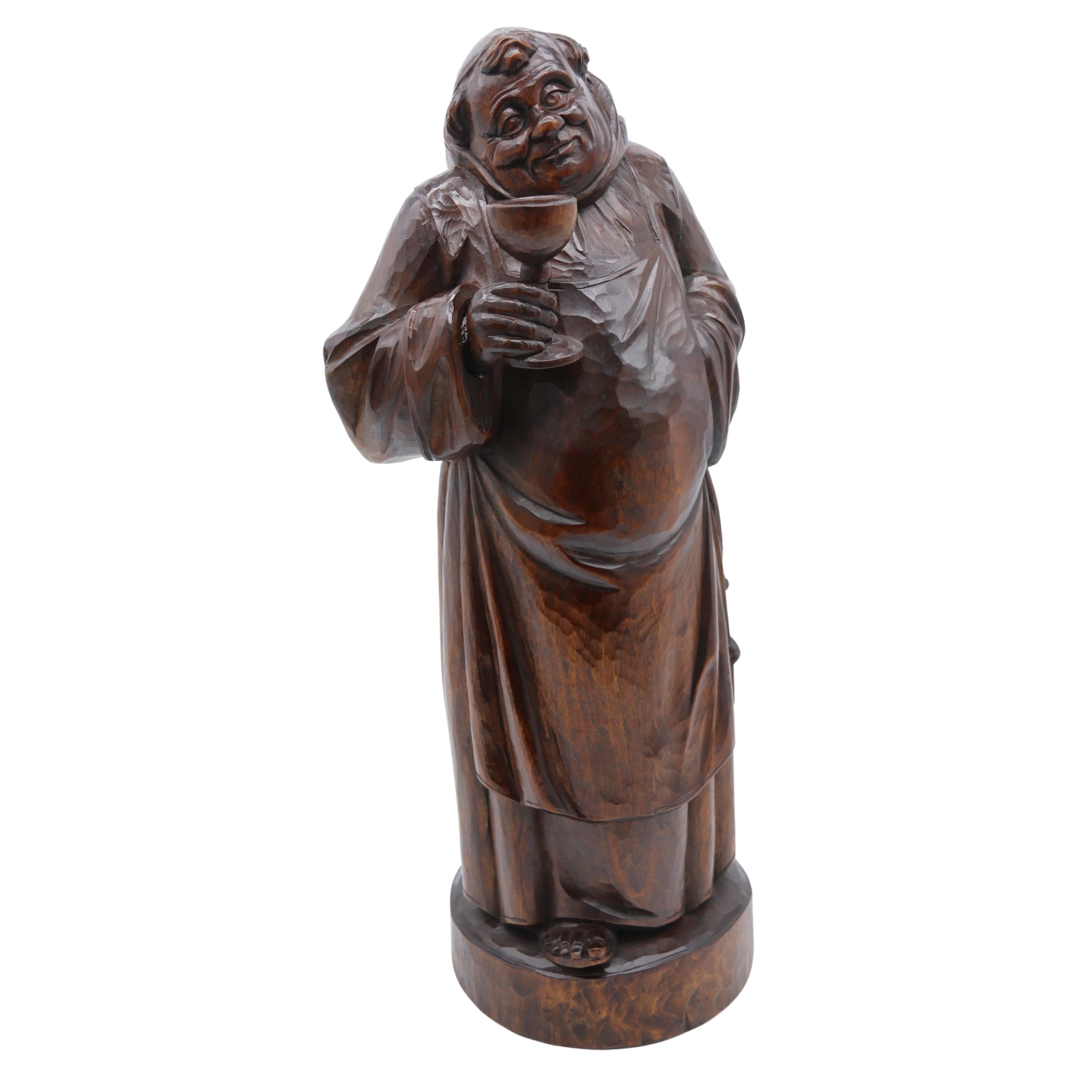 A Large Black Forest carved limewood study of a monk, Swiss, circa 1900 For Sale