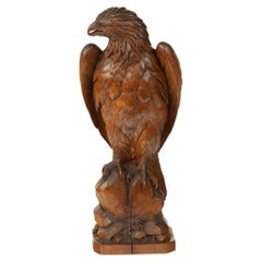 A large Black Forest linden wooden carving of an eagle