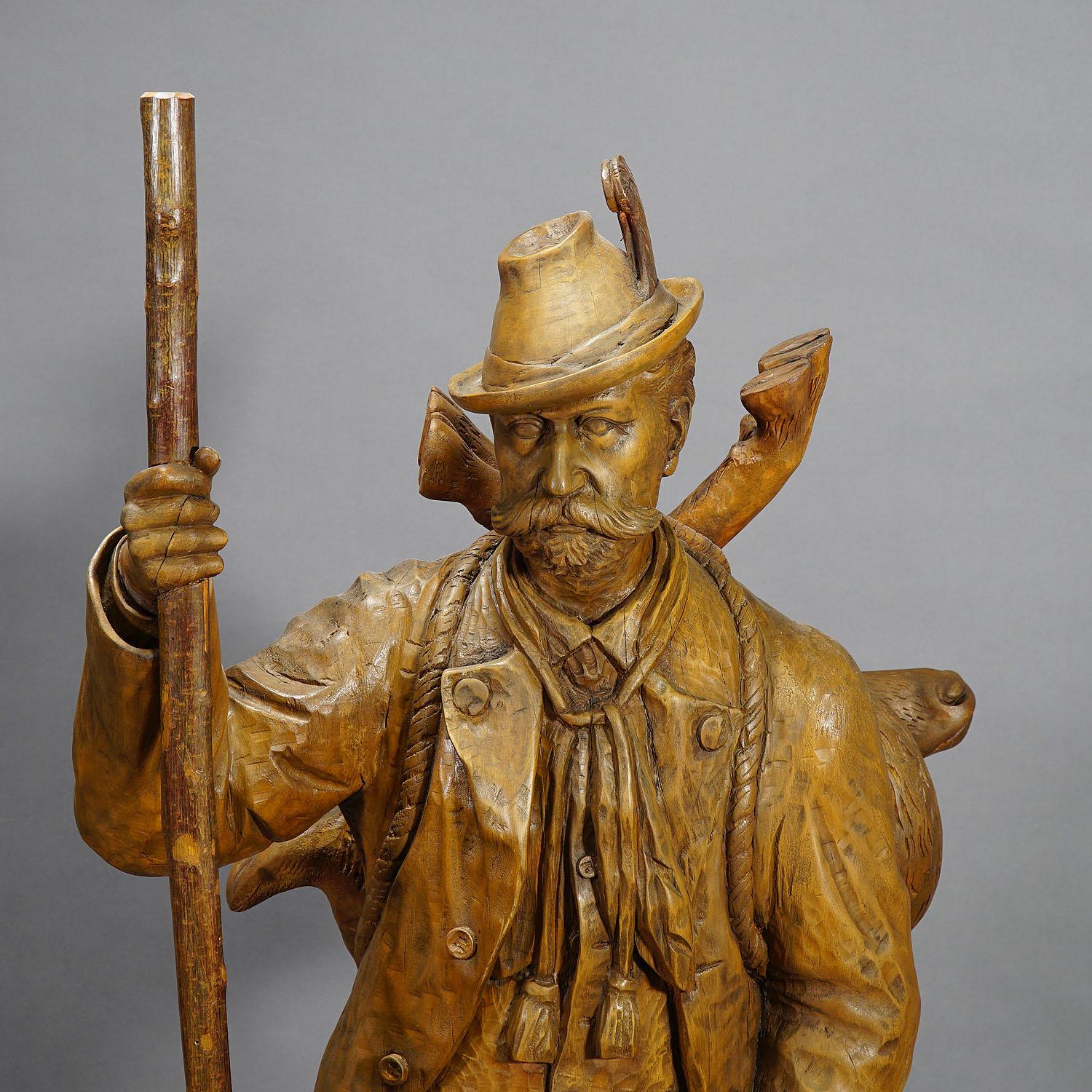 Carved Large Black Forest Poacher with Chamois For Sale