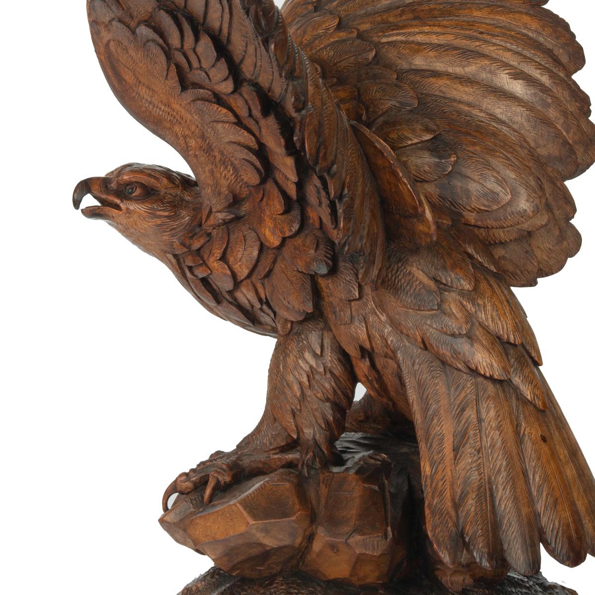 Swiss A large Black Forest walnut wooden carving of an eagle For Sale