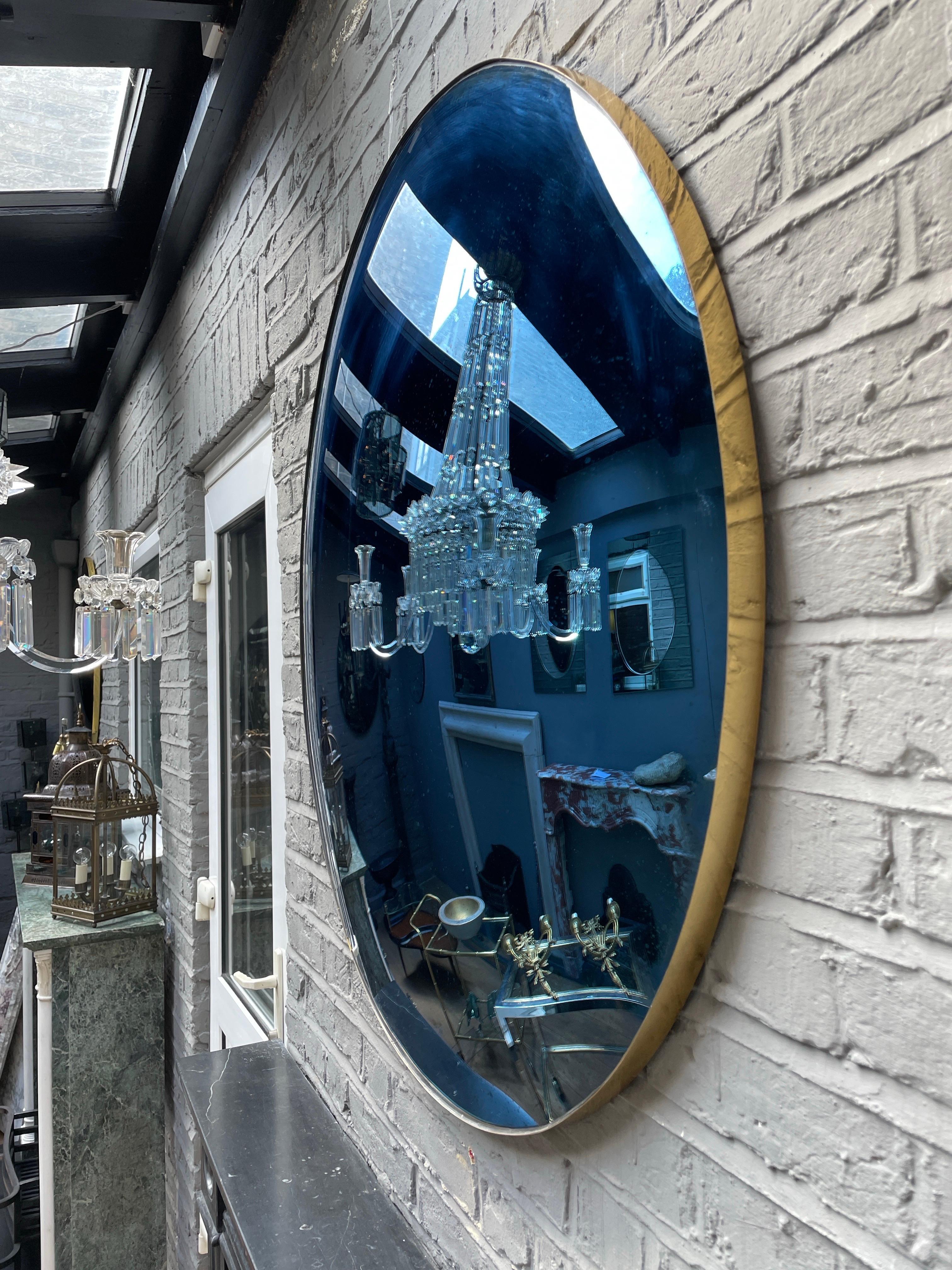 Brass A Large Blue Convex Mirror with distressed finish For Sale