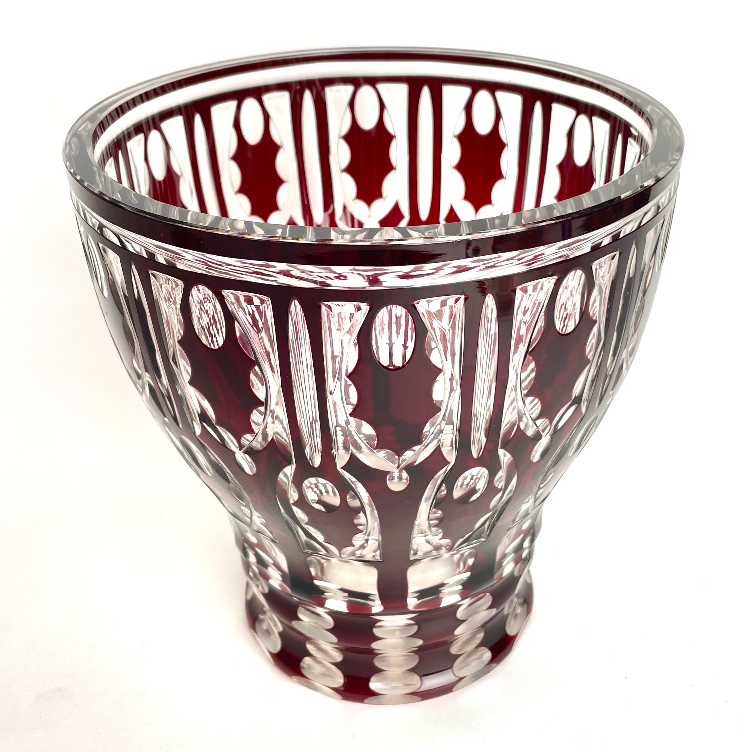 A large Bohemia Cut Crystal Vase from early 20th Century. Beautiful color and fine craftmanship. Can also be used as a wine cooler.

Wear consistent with age and use 