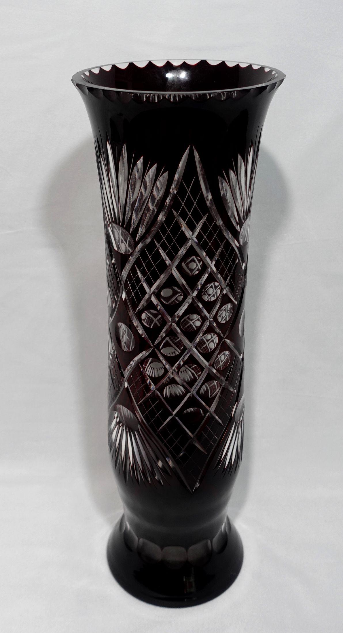A Large Bohemian Style Ruby Cut to Clear Art Glass Vase

This Bohemian-style Ruby cut-to-clear vase is a beautiful handblown example of this. In excellent condition, this is both a lovely and practical piece. Sure to suit any Victorian terrace or