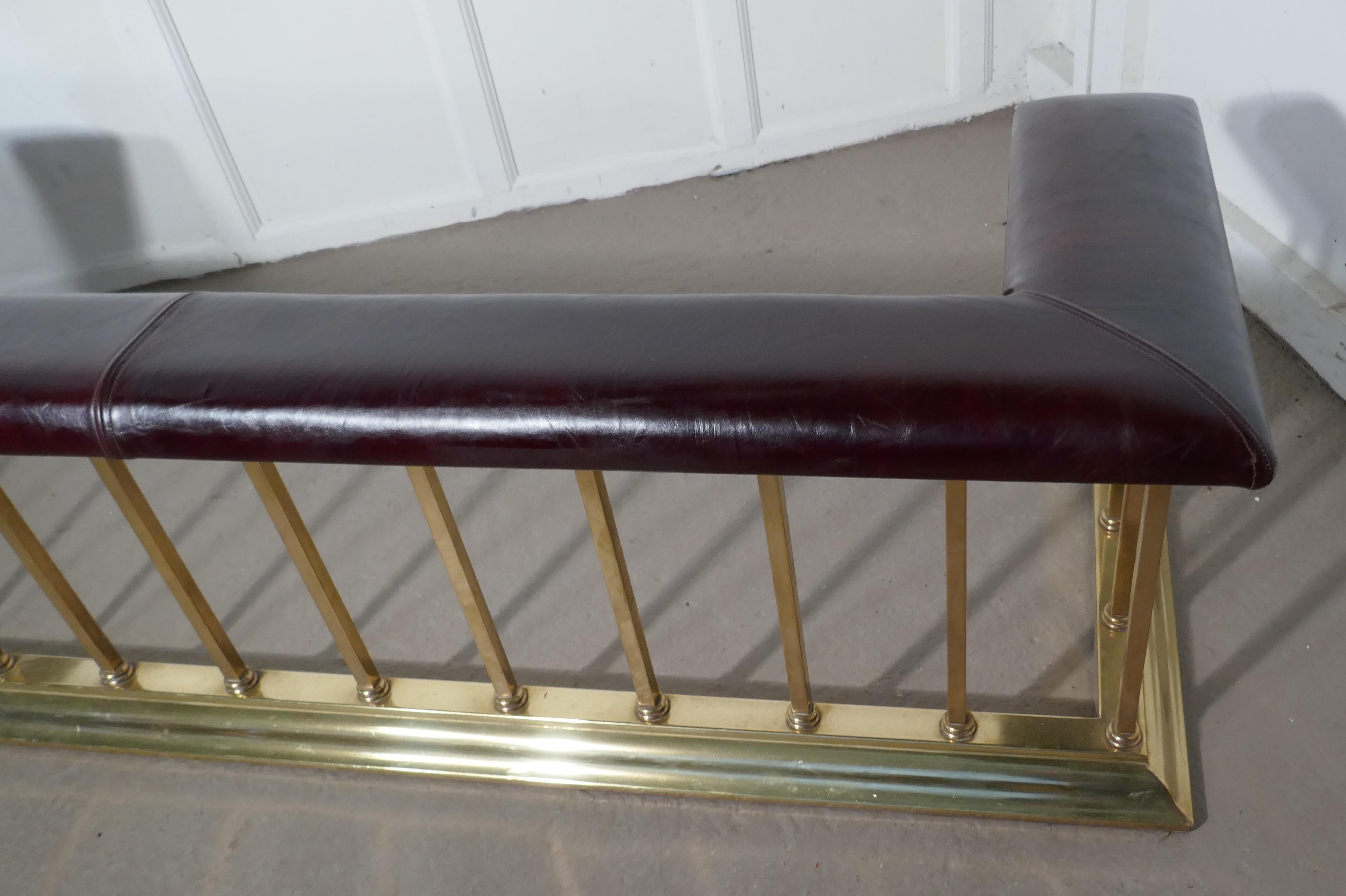A large brass and leather club fender

This is an elegant piece of country House Furnishing, the soft claret red leather seat has been recently upholstered 

The Brass fender is in good condition, and would be a superb addition to any Open