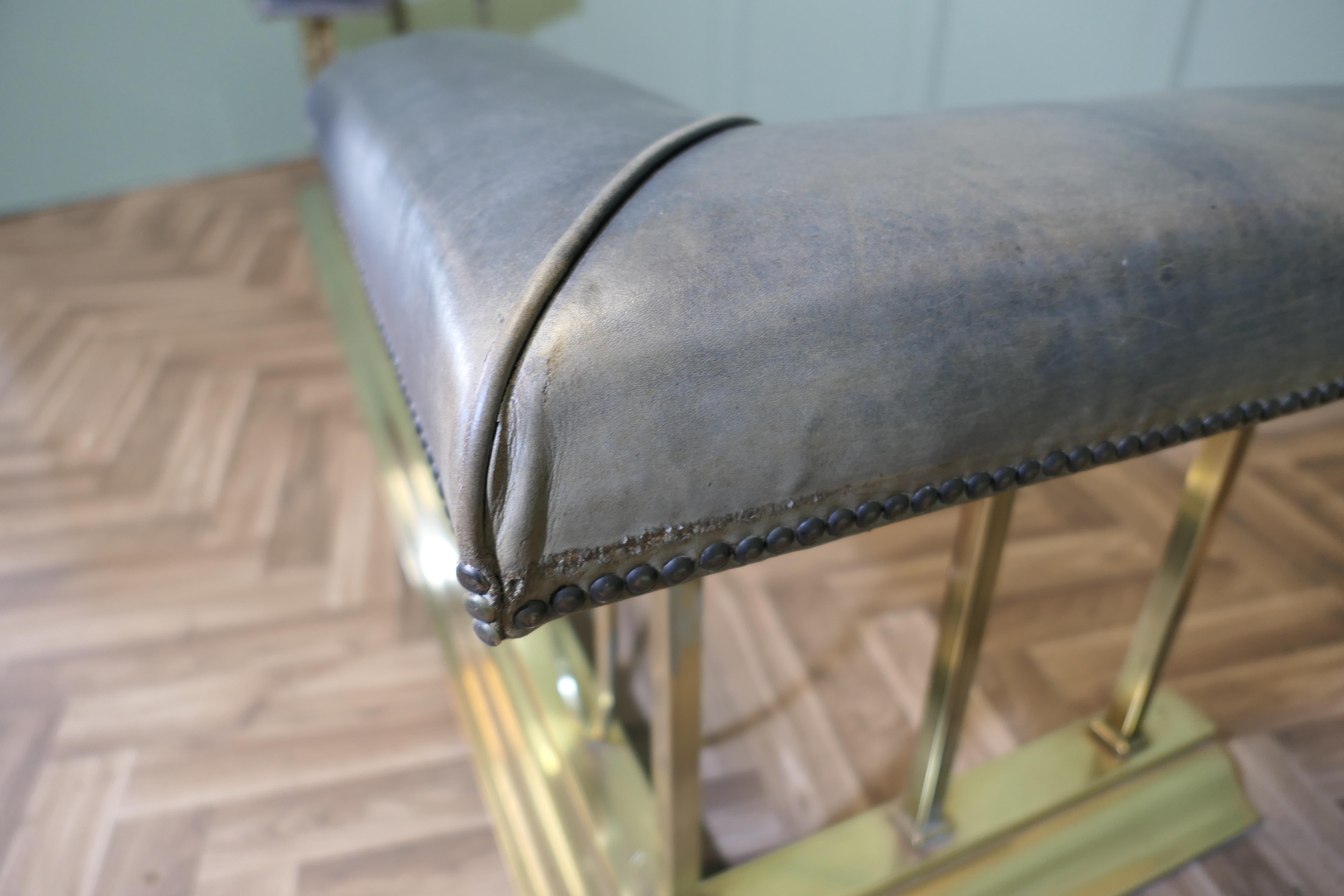 A Large Brass and Leather Club Fender  This is an elegant piece 2
