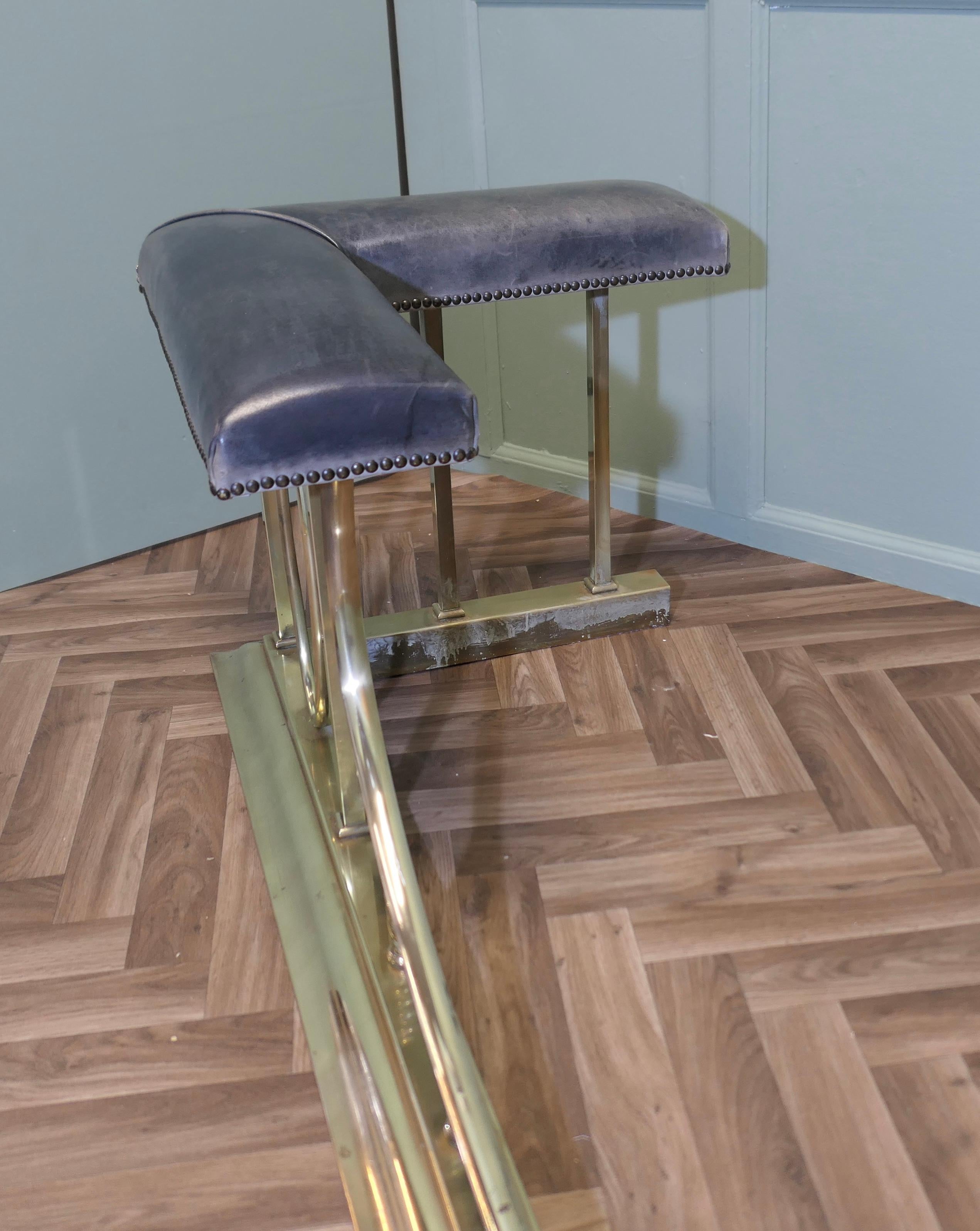 A Large Brass and Leather Club Fender  This is an elegant piece 3