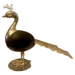 A large Brass And Ostrich Egg Peacock By Antonio Pavia