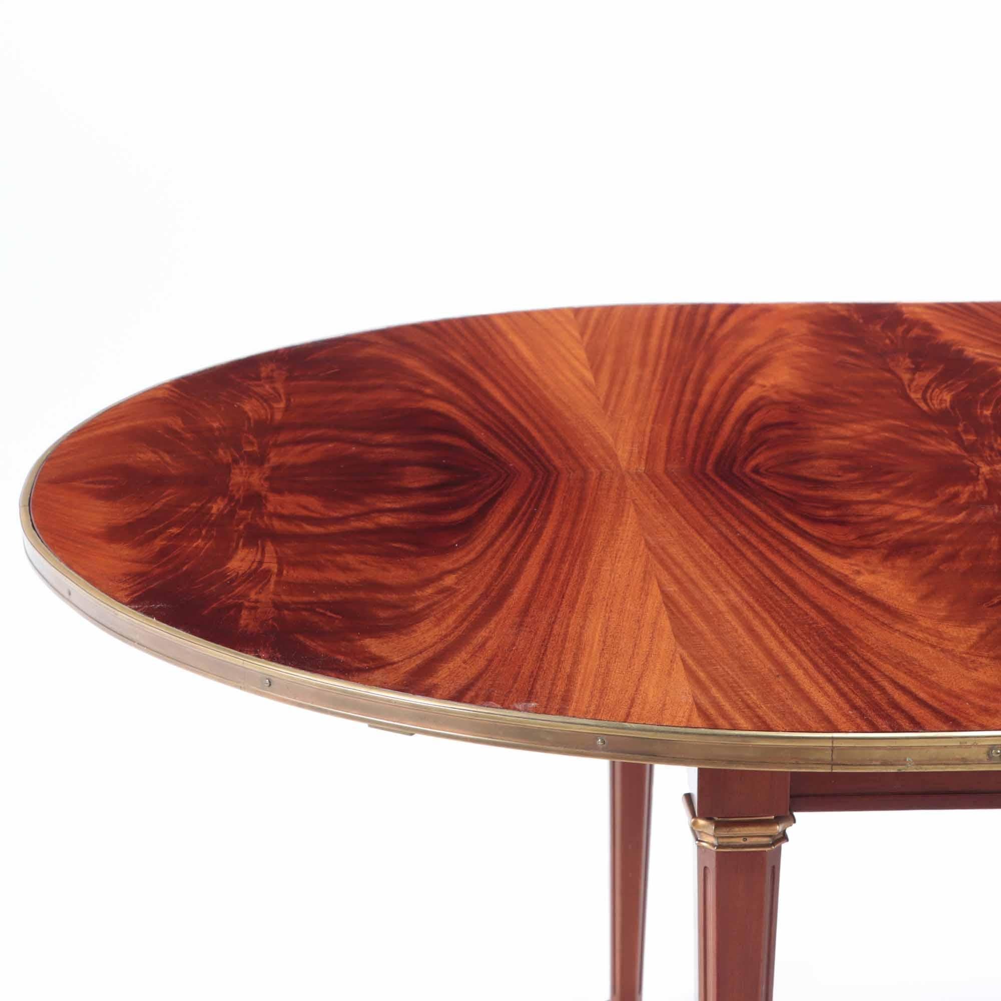 French Large Bronze Mounted Flame Mahogany Dining Table with 2 Leaves, circa 1945