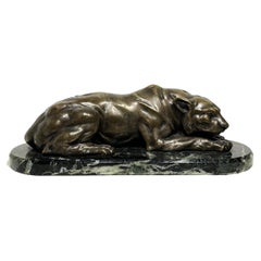 Antique Large Bronze Sculpture Depicting a Recumbent Lioness Mounted on a Marble Based