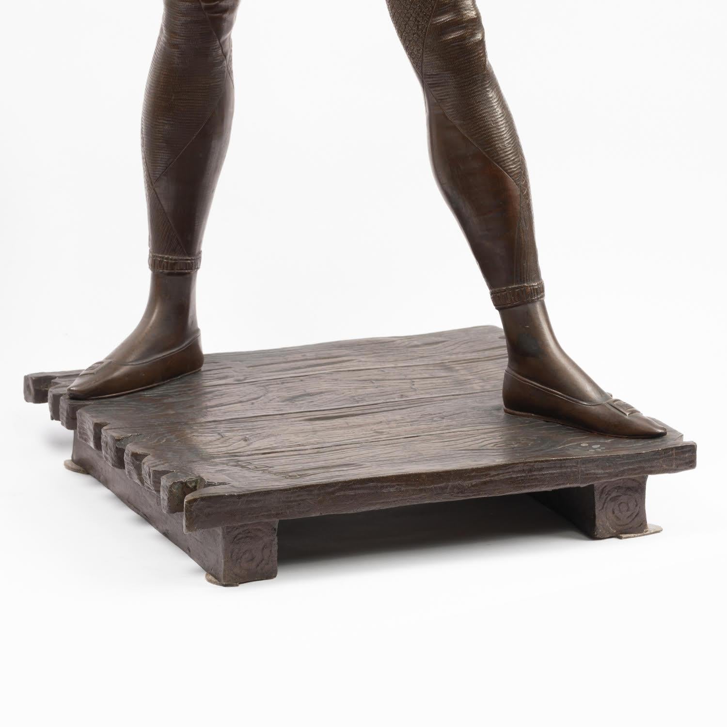 Bronzo Grande scultura in bronzo di Arlecchino di Paul Dubois, XIX secolo. in vendita