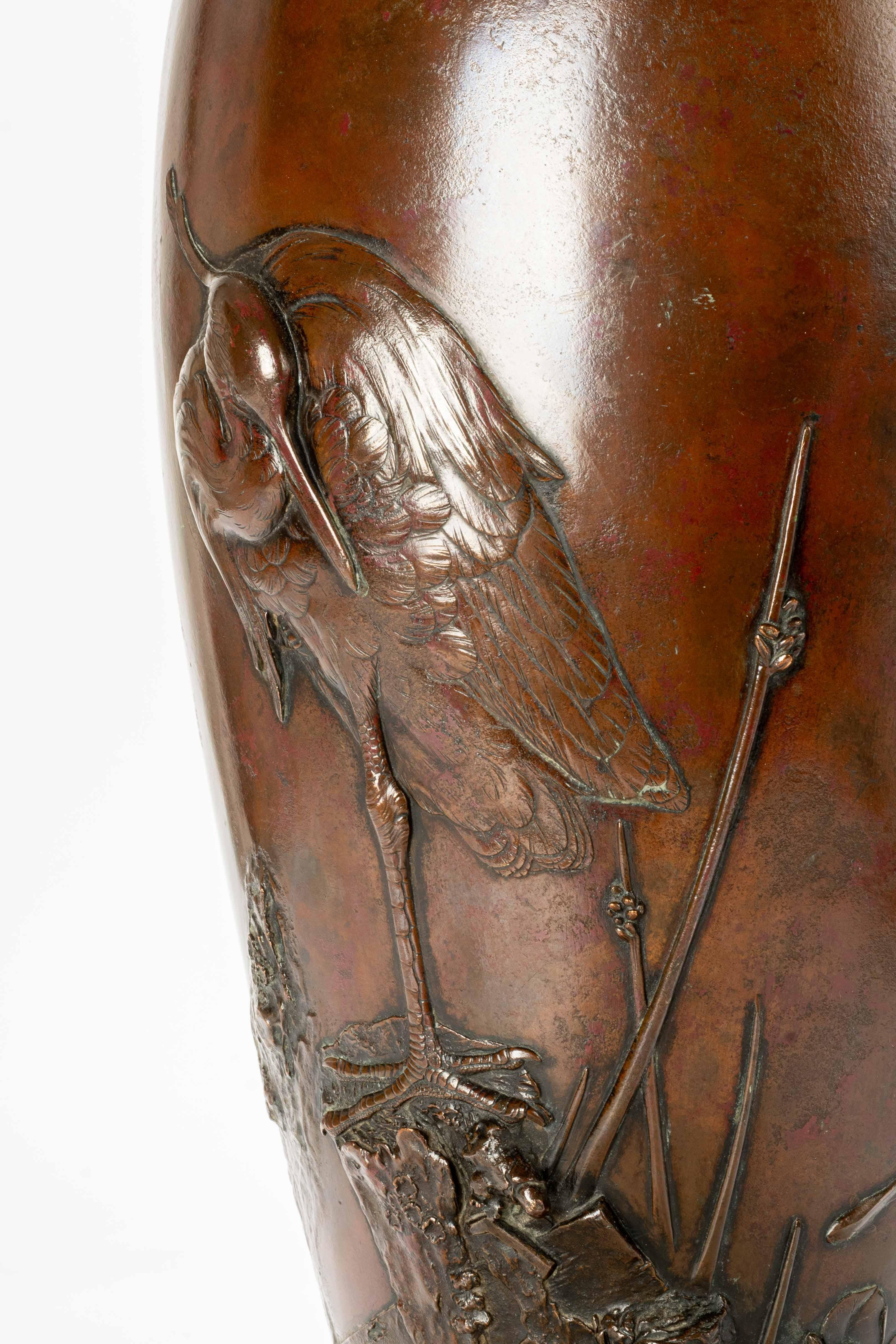 19th Century A large bronze vase depicting an egret