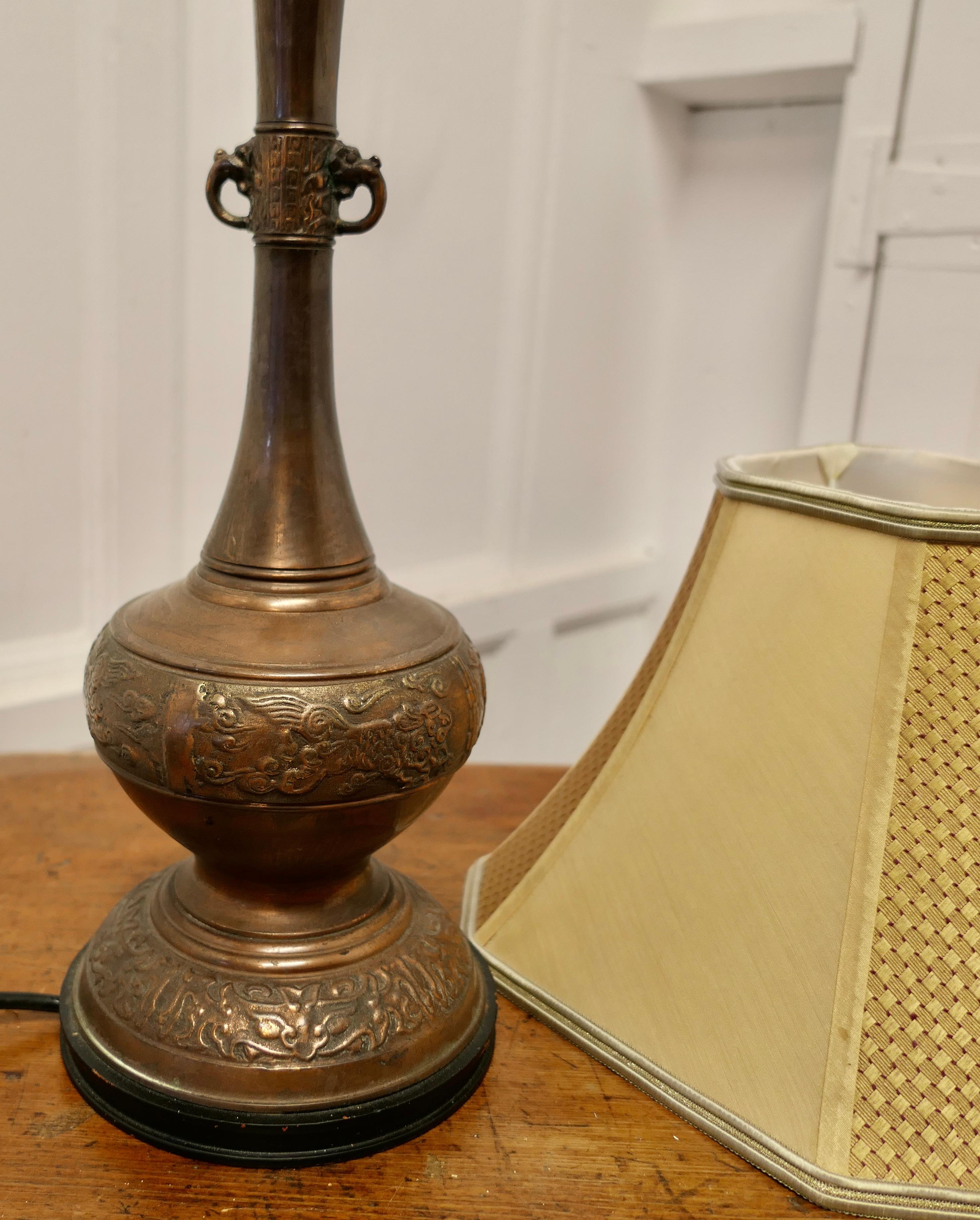 A Large Bulbous Embossed Copper Table Lamp     For Sale 1