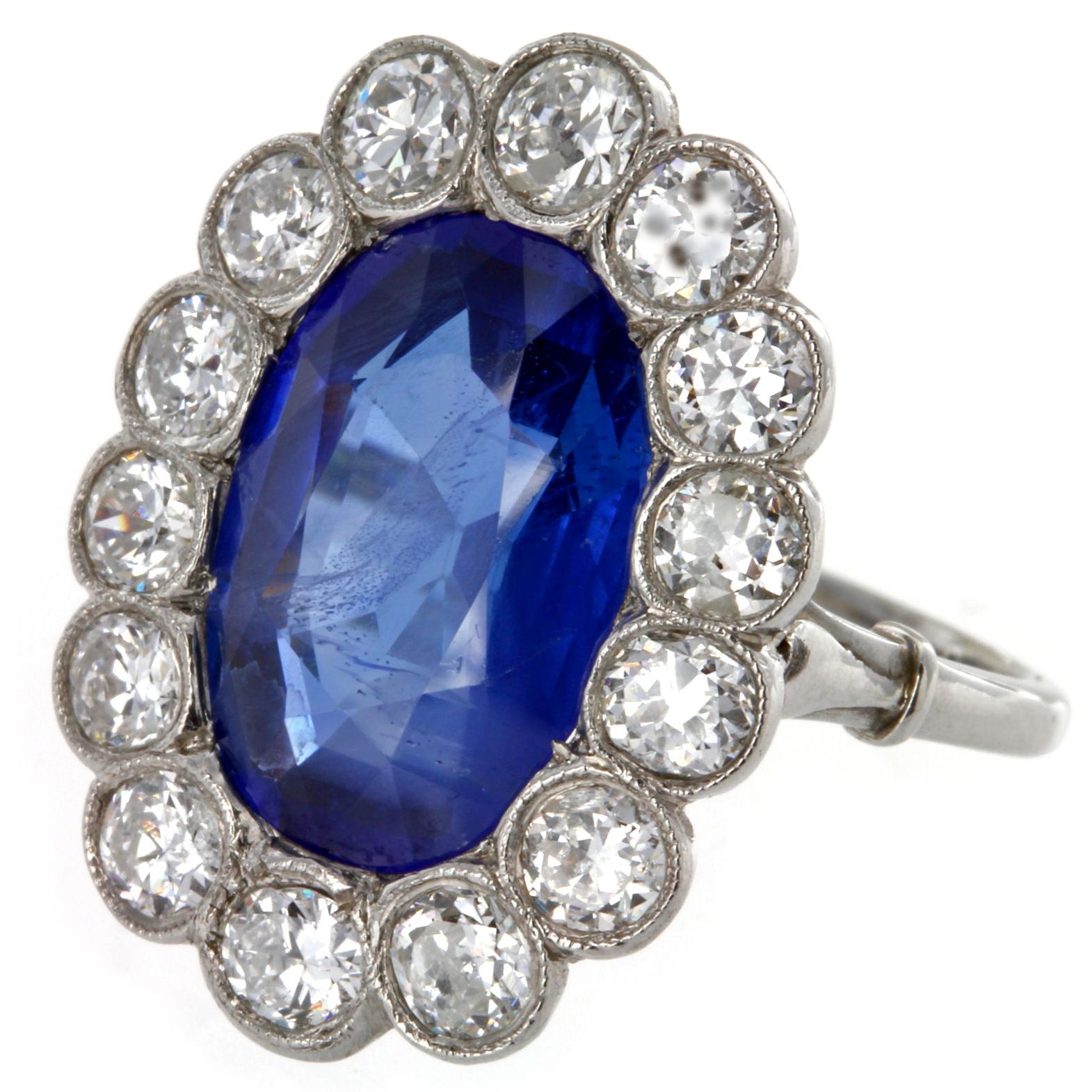 Modern Large Burma Sapphire and Diamond Cluster Ring For Sale