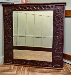 A Large Carved Oak Wall Mirror  The wide Oak Mirror Frame is Beautifully Carved