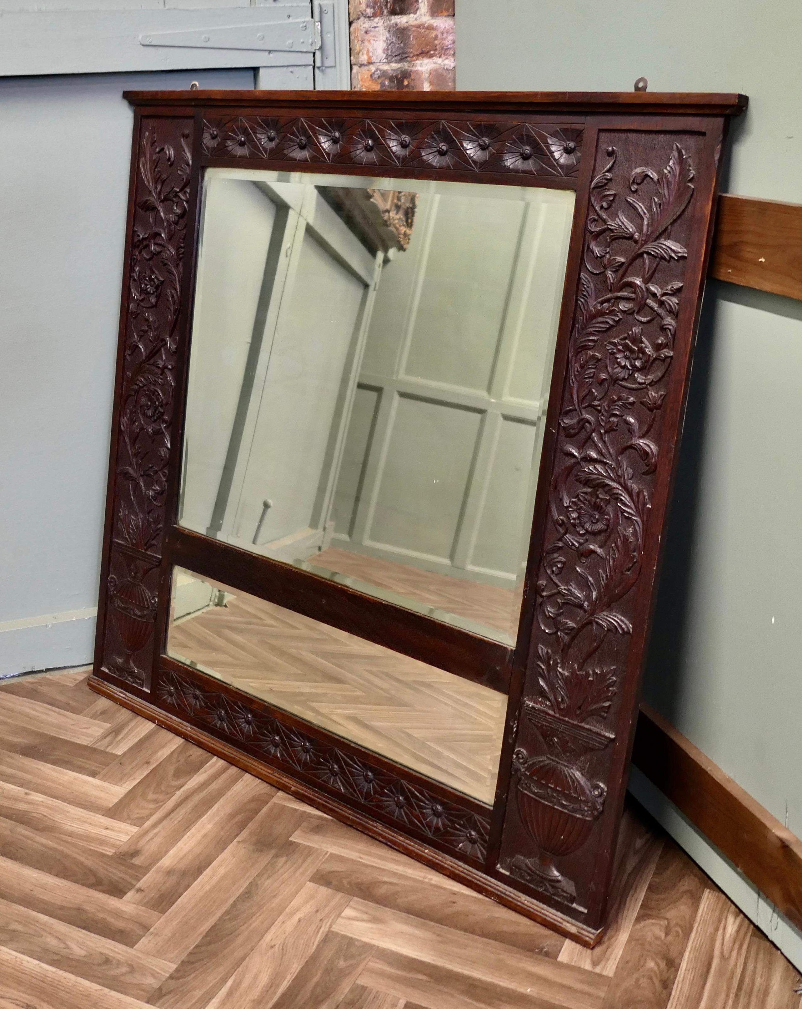 Arts and Crafts A Large Carved Oak Wall Mirror  The wide Oak Mirror Frame is Beautifully Carved For Sale