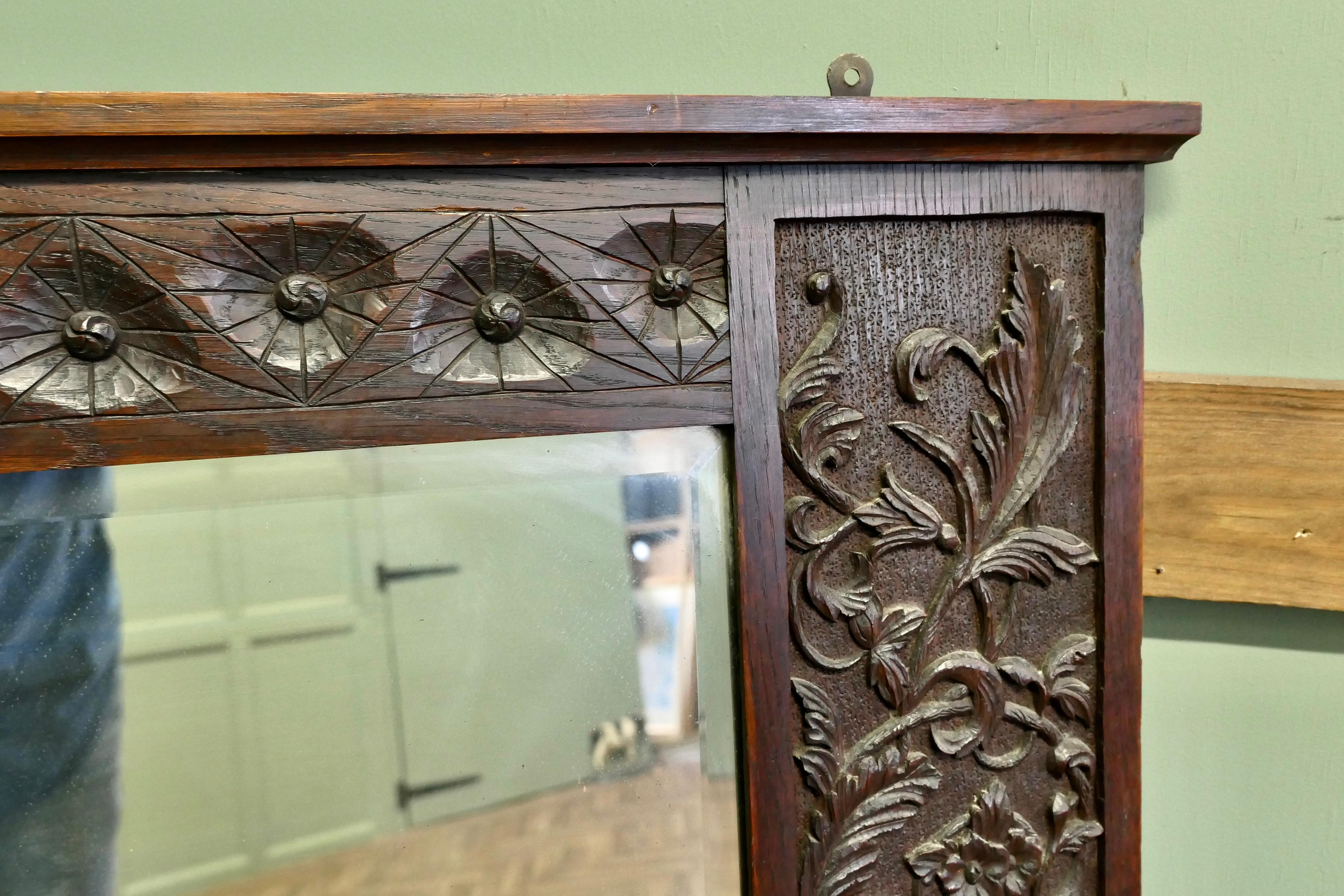 A Large Carved Oak Wall Mirror  The wide Oak Mirror Frame is Beautifully Carved In Good Condition For Sale In Godshill, Isle of Wight