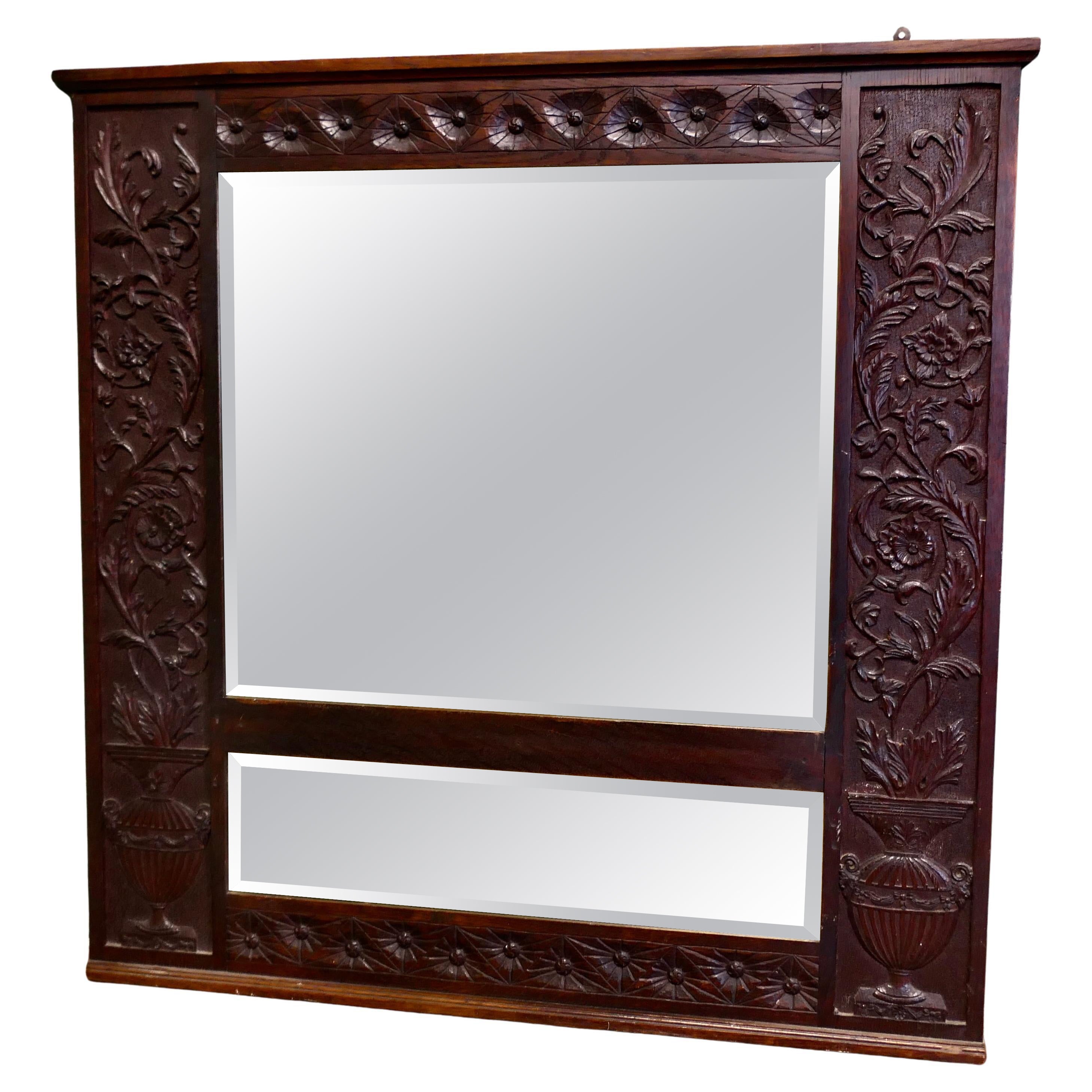 A Large Carved Oak Wall Mirror  The wide Oak Mirror Frame is Beautifully Carved For Sale