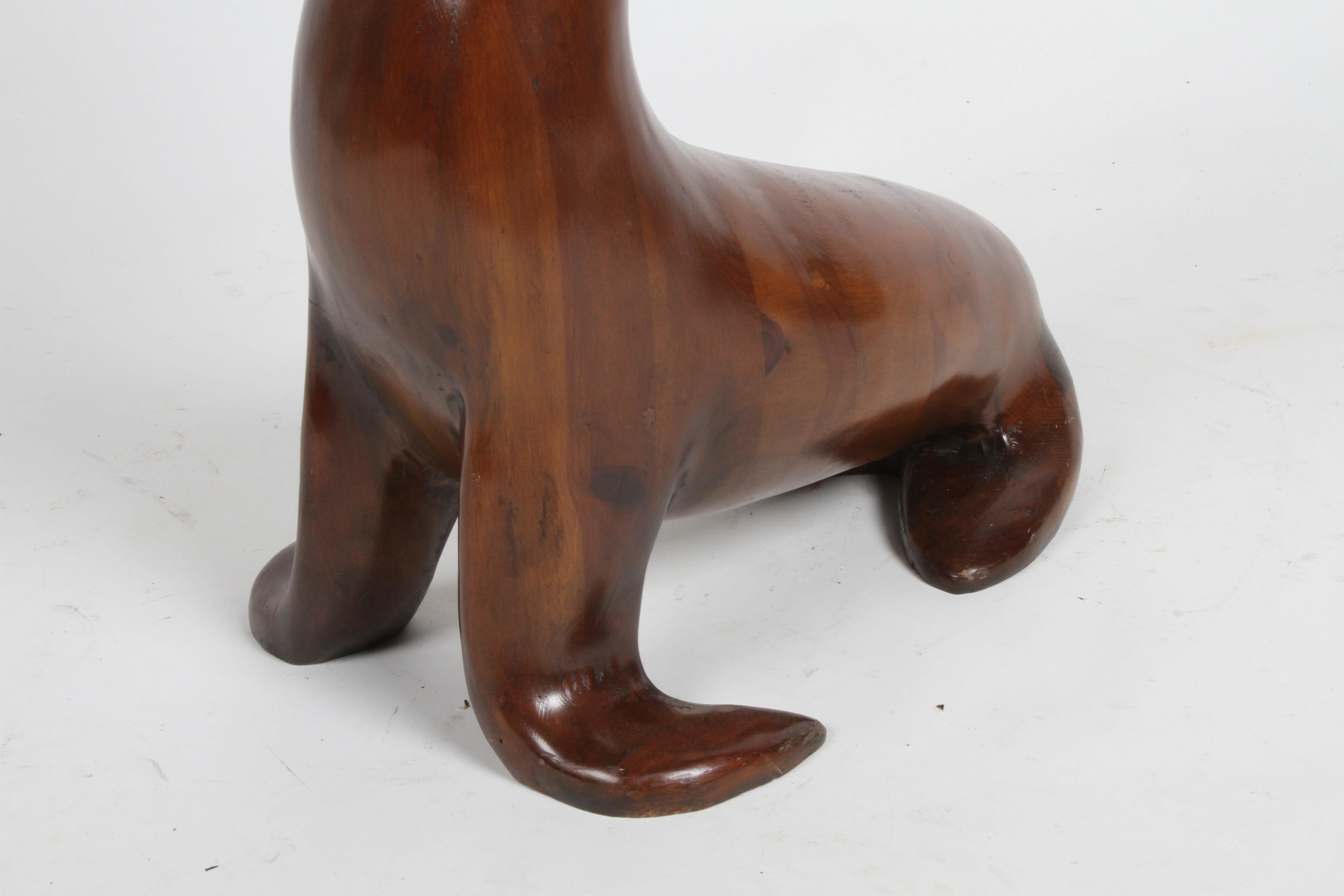 Mid-Century Modern Large Carved Sculptural Sea Lion or Seal in Elmwood Balancing a Brass Ball For Sale