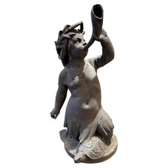 A Large Cast Bronze Triton Riding on a Turtle, Plumbed as a Fountain