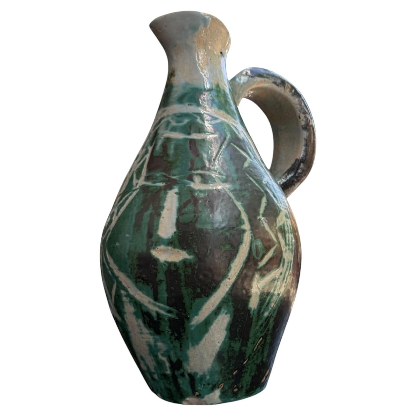 A large ceramic vase by Danikowski who collaborated with Guillerme et Chambron