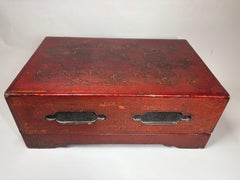 A Large Chinese Qing Dynasty gilt-decorated red lacquer box and cover