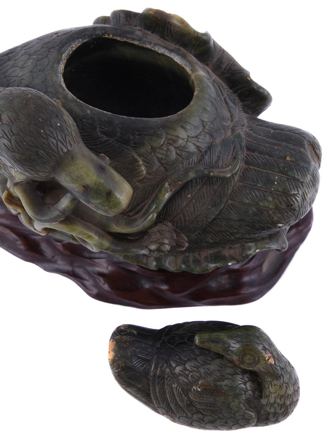 A Chinese Spinach Jade Duck Carving, Qing Dynasty 1