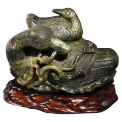 A Chinese Spinach Jade Duck Carving, Qing Dynasty