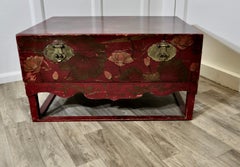 A Large Chinoiserie Marriage Chest on Stand