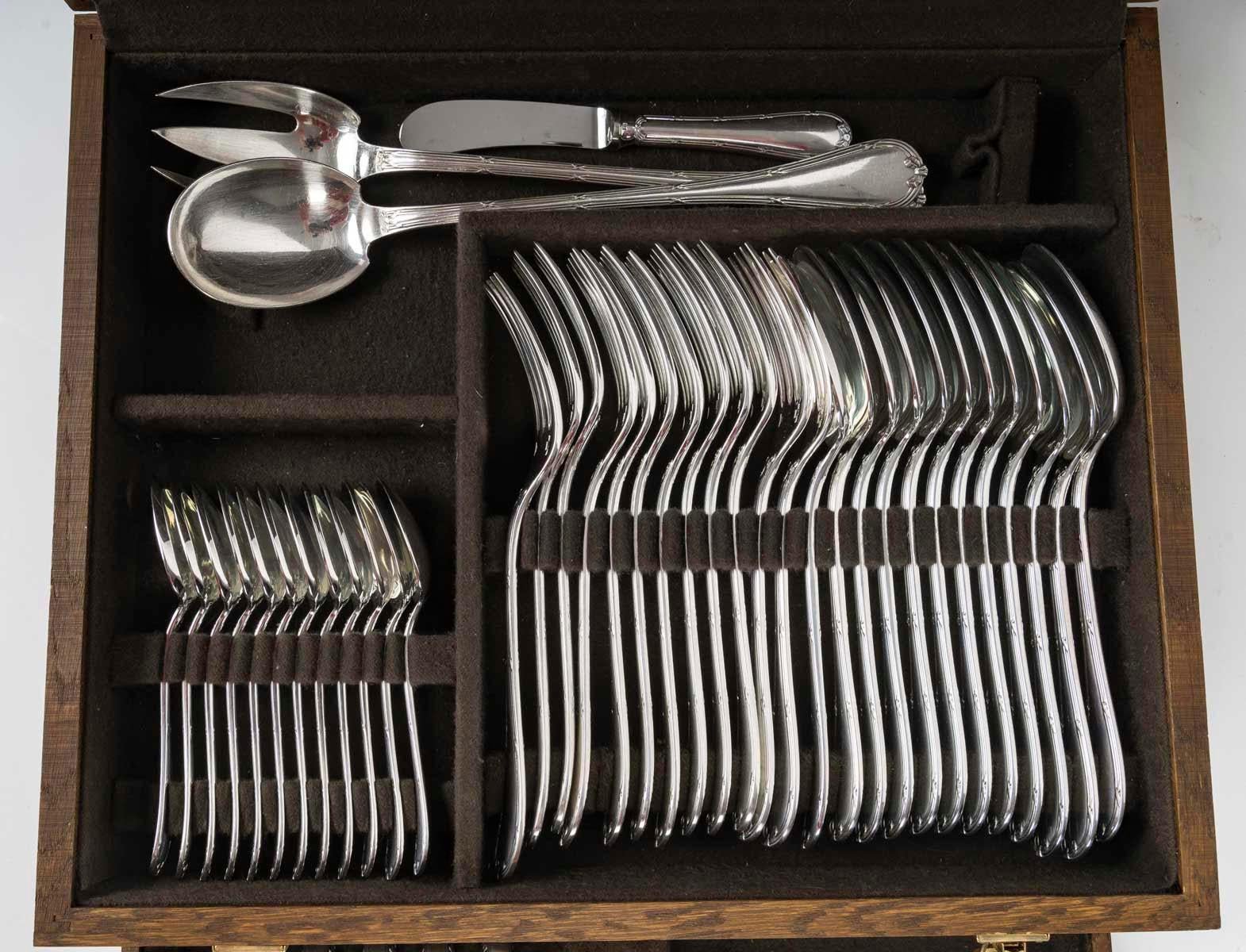 French A Large Christofle Service in a Patinated Wooden Box, 63 Pieces, Full.