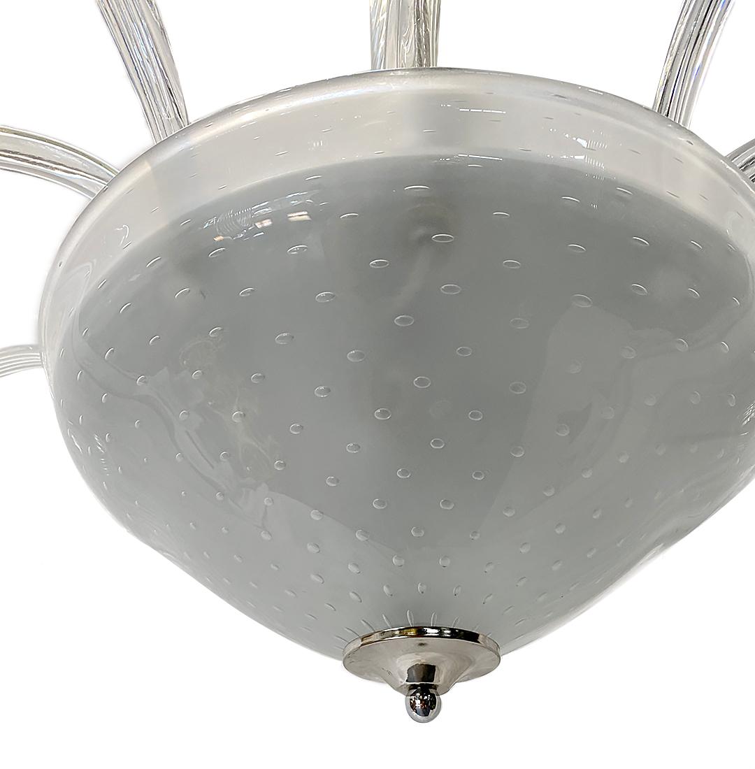 A circa 1950's blown Murano glass five-arm chandelier with nickel-plated body.

Measurements:
Diameter 42