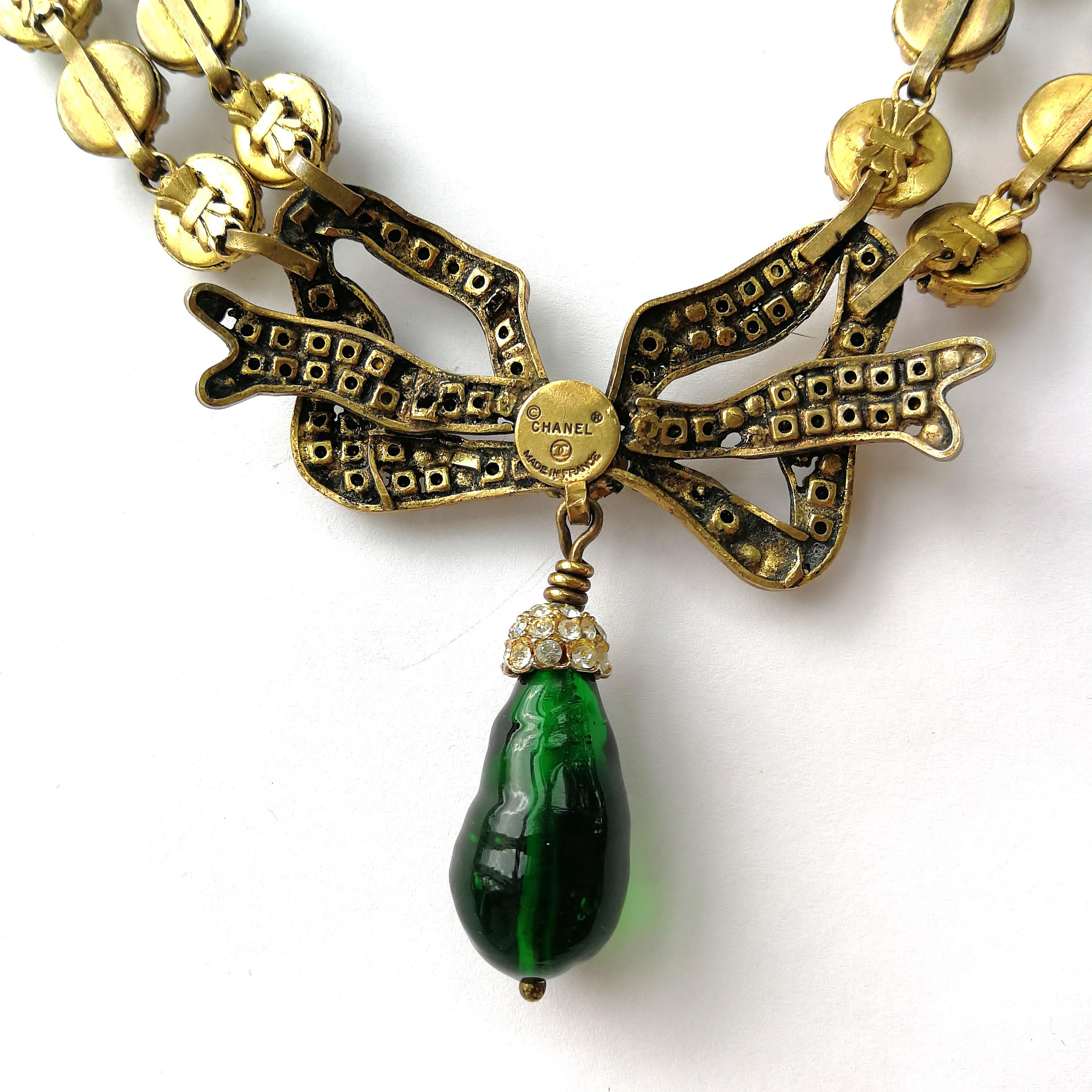 A large clear paste, emerald poured glass 'bow' necklace, Chanel, France, 1980s 3