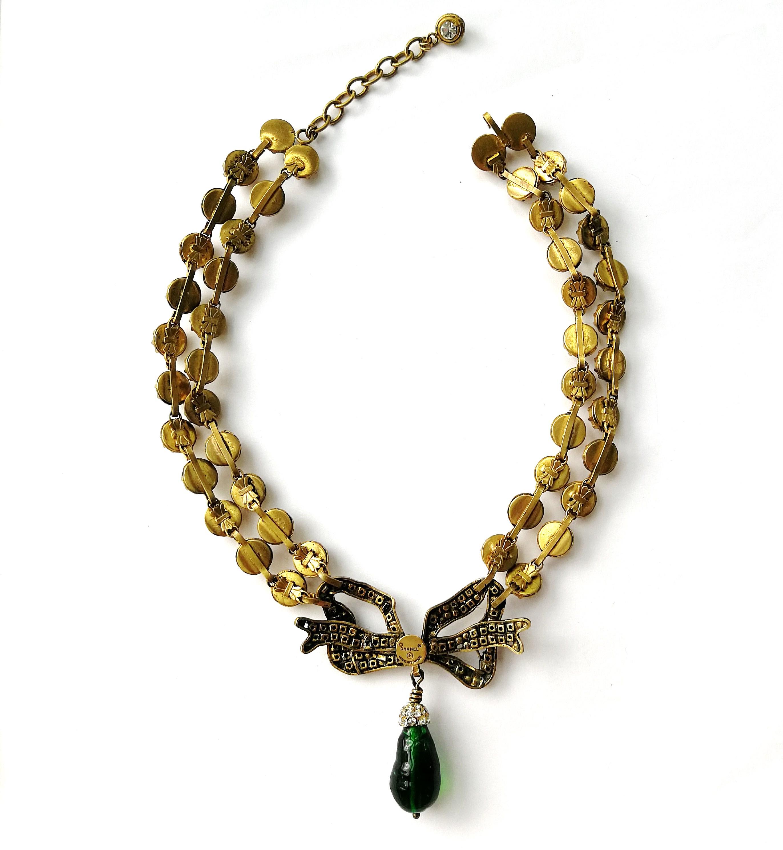 A large clear paste, emerald poured glass 'bow' necklace, Chanel, France, 1980s 4