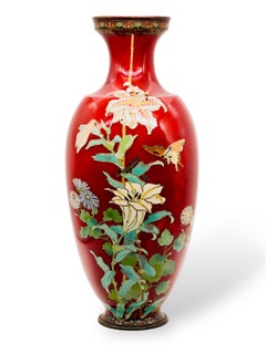 A Large Cloisonné Enamel Vase decorated with flowers and butterflies. Meiji Era
