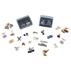 A large collection of Scandinavian cufflinks in gilded metal and plated silver