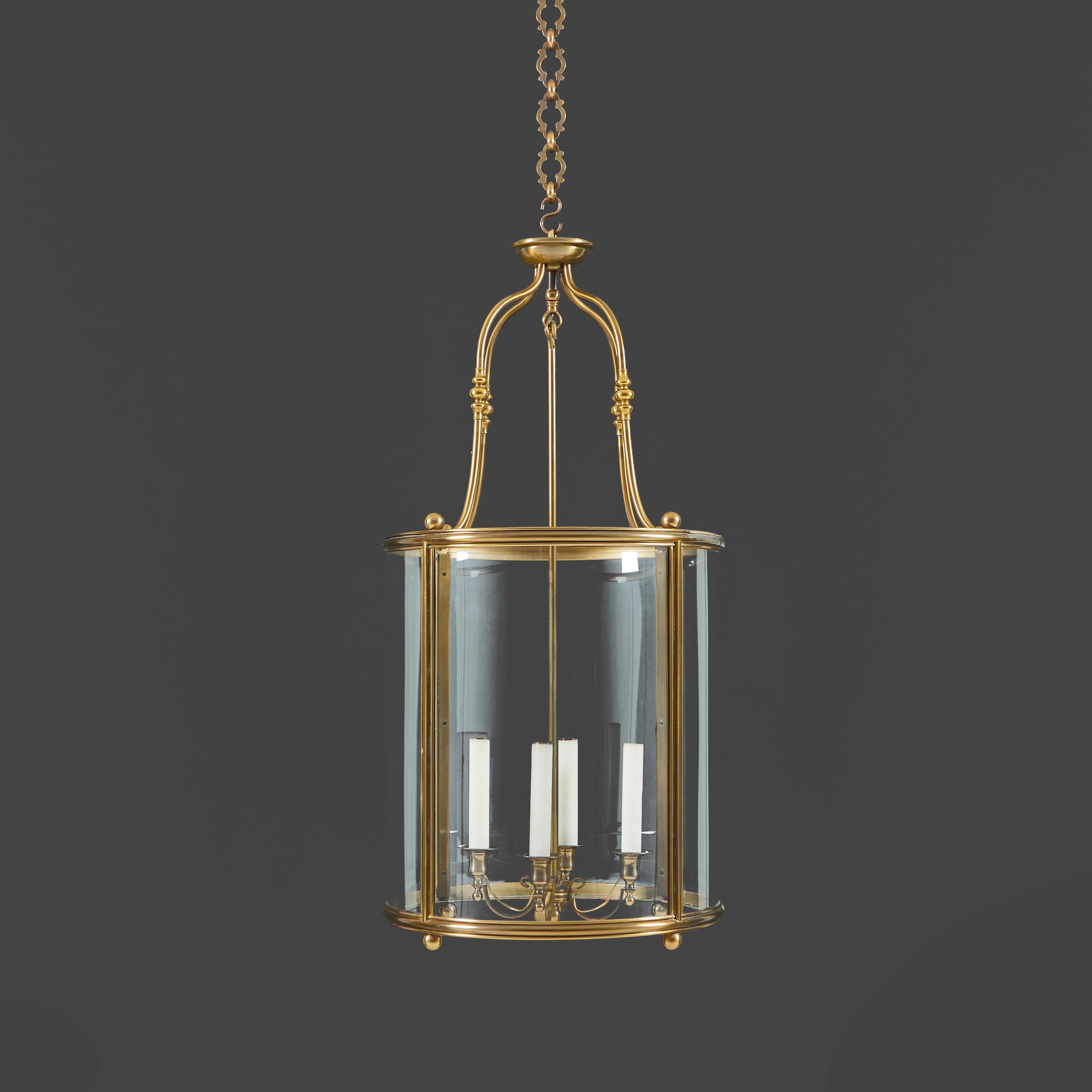 French A Large Cylindrical Brass Hall Lantern With Curved Glass For Sale