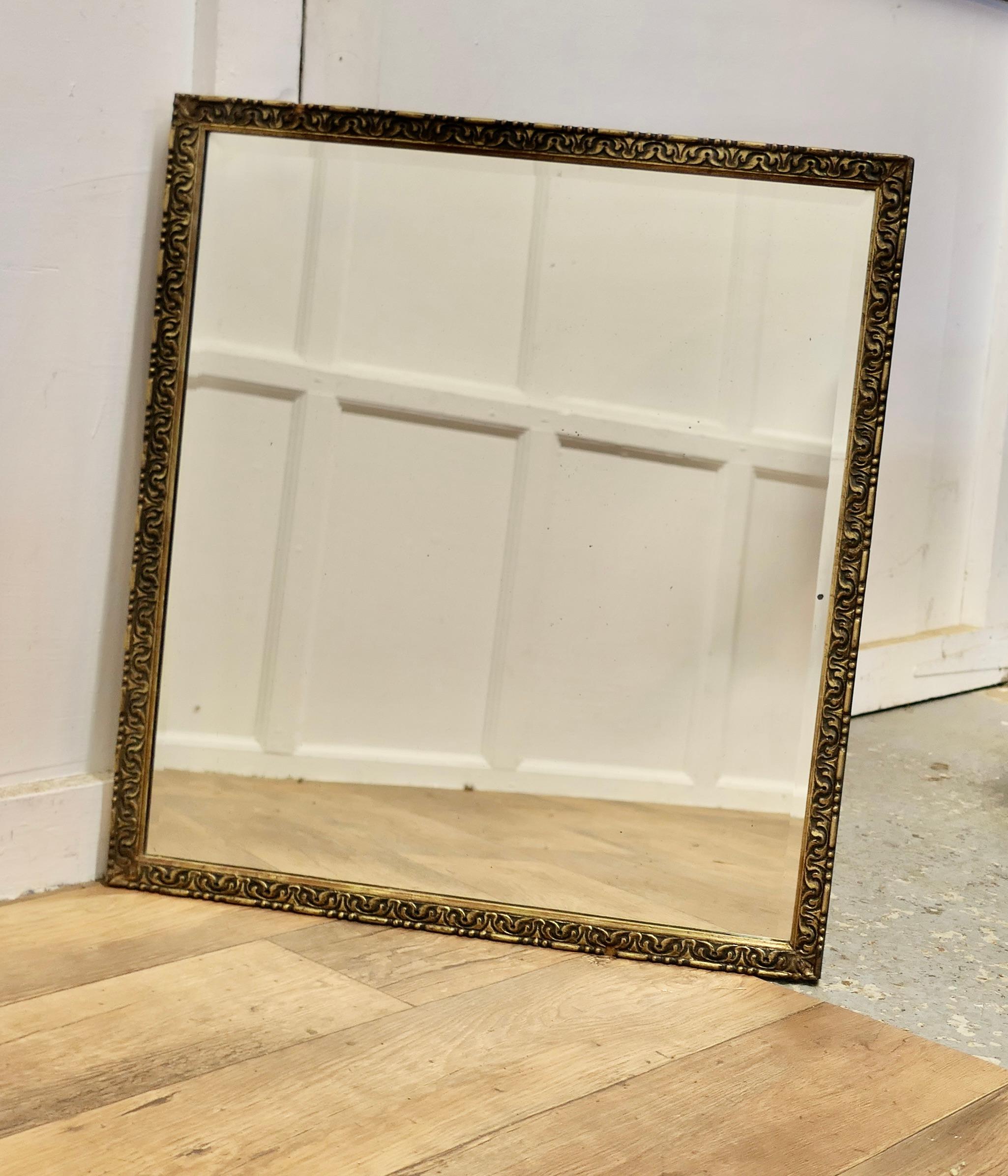 A Large Decorative Gilt Wall Mirror

A delightful piece, the mirror has a 1” wide Gilt moulded frame in tones of gold, the thick bevelled looking glass is in good and in unblemished condition. 
A good decorative piece
The frame is 29” high and 66”