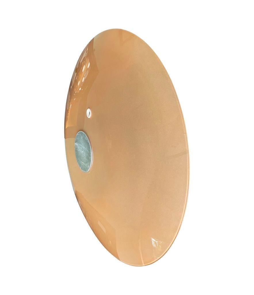Mid-20th Century A large dusty pink concave framed circular mirror in the Style of Max Ingrand For Sale