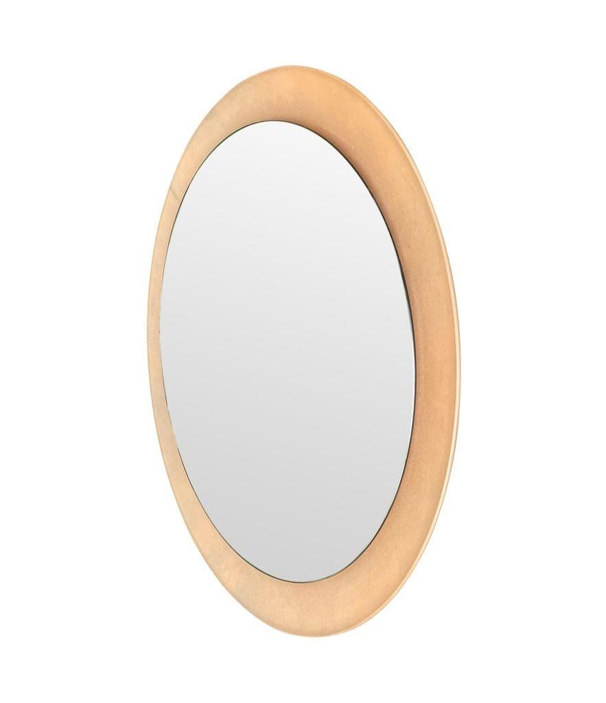 A large dusty pink concave framed circular mirror in the Style of Max Ingrand For Sale 1