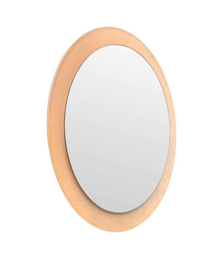 A large dusty pink concave framed circular mirror in the Style of Max Ingrand For Sale 4