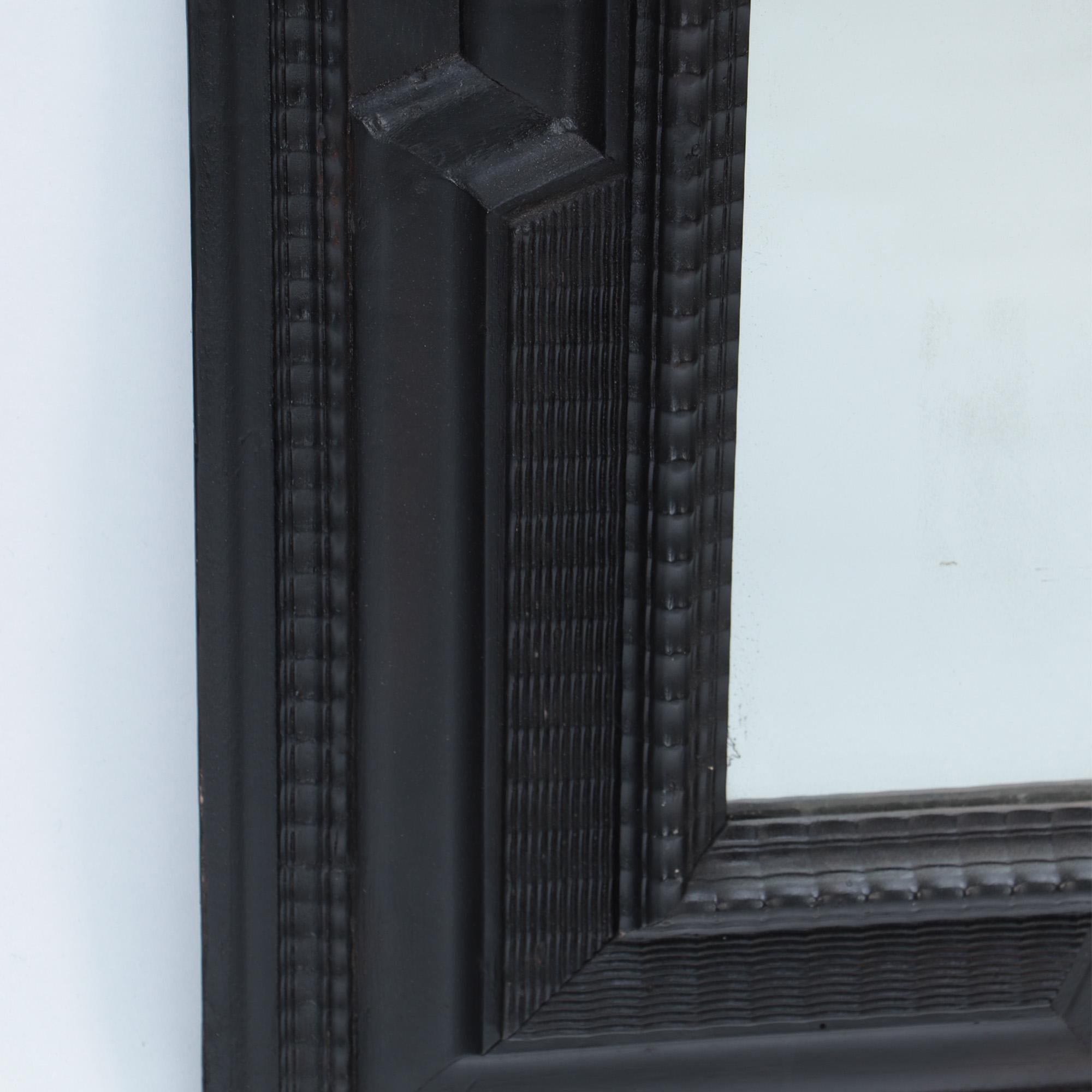 Mid-20th Century A Large Dutch style ebonIzed frame with ripple carving. Circa 1940.
