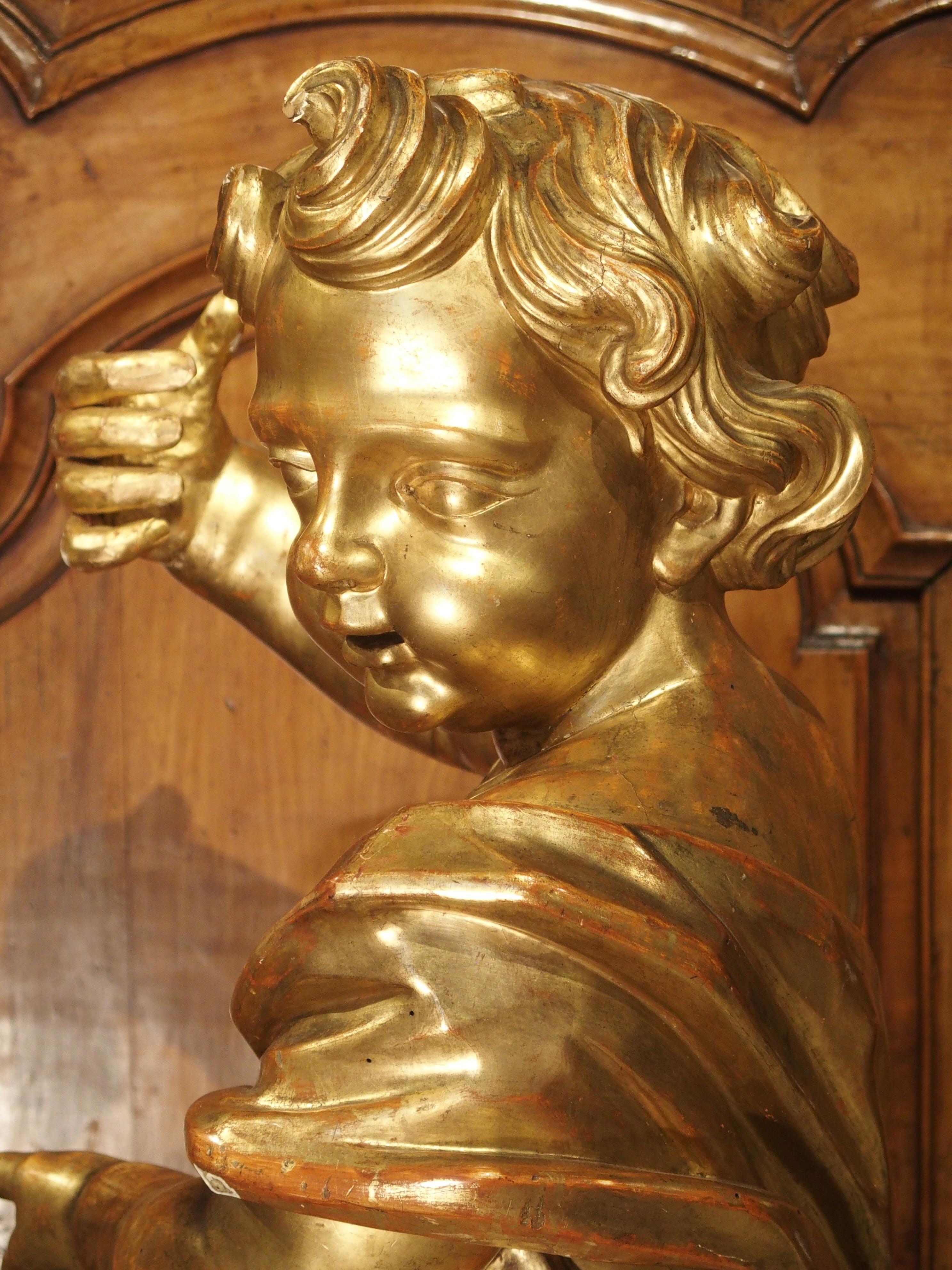 Large Early 18th Century Carved Giltwood Cherub Statue from Italy For Sale 12