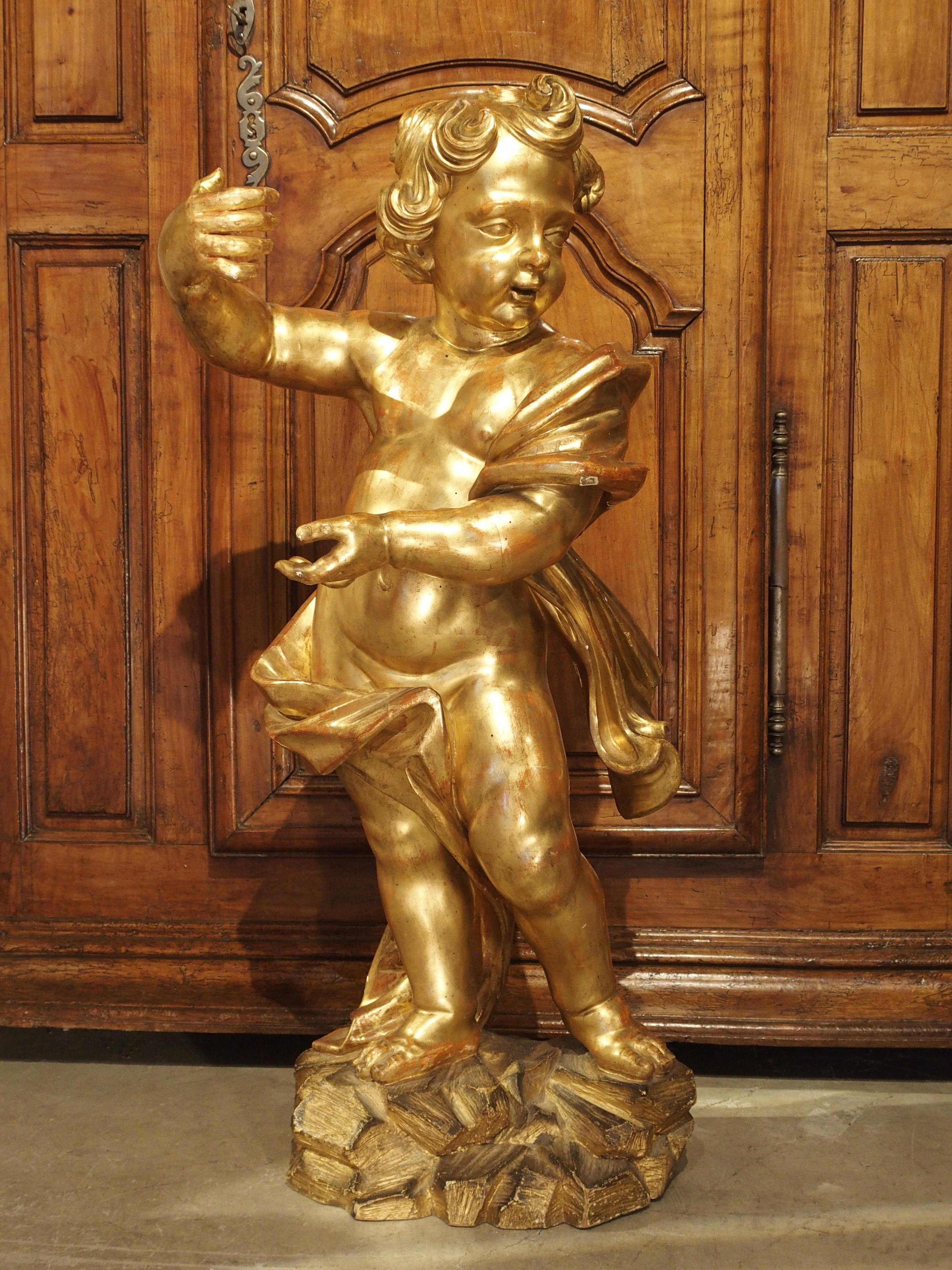 Large Early 18th Century Carved Giltwood Cherub Statue from Italy For Sale 13