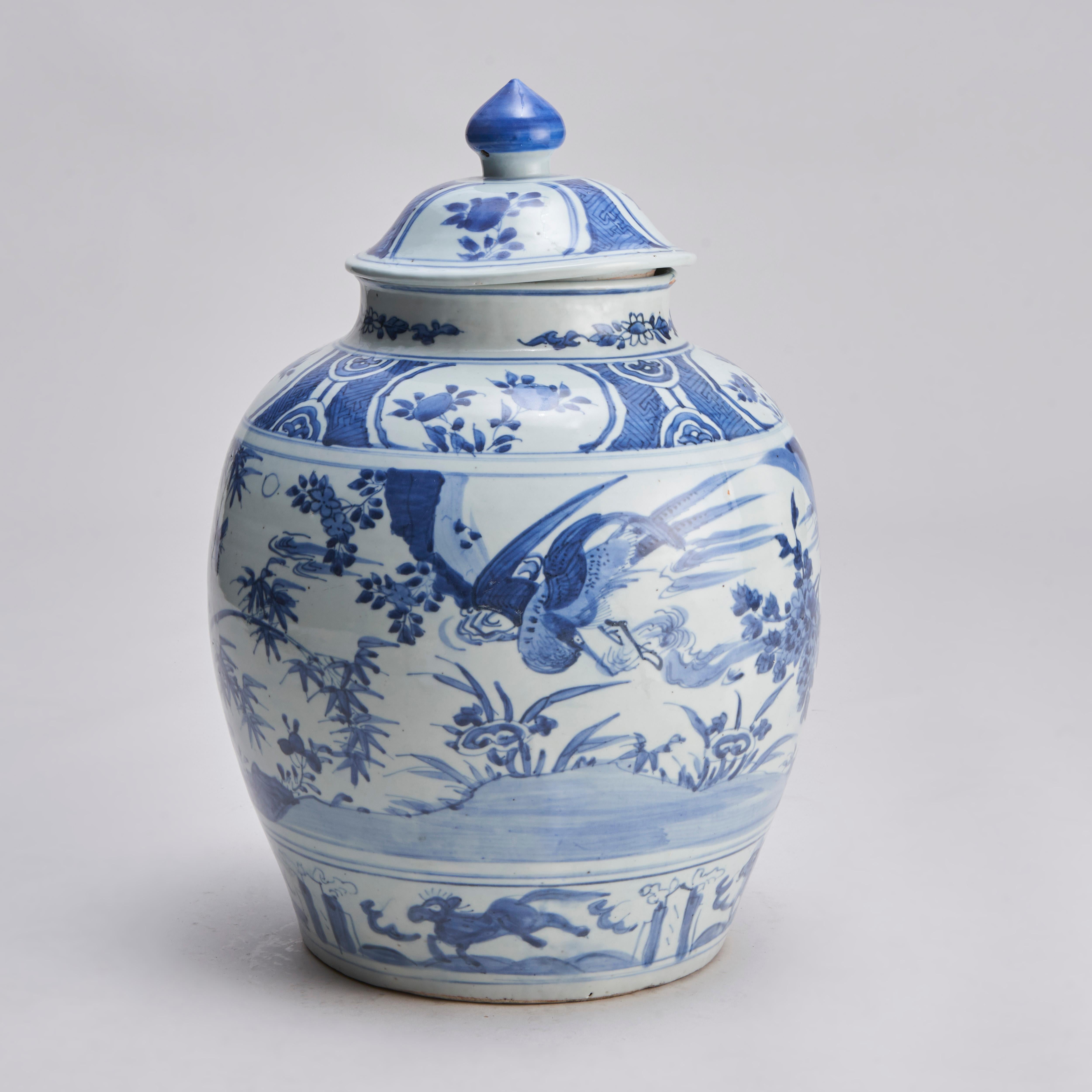 From our collection of antique Chinese porcelain, this early 19th century Chinese blue and white jar and cover with wrap around decoration of pheasants among peonies and bamboo, the bottom border with a design of frolicking horses, the neck with