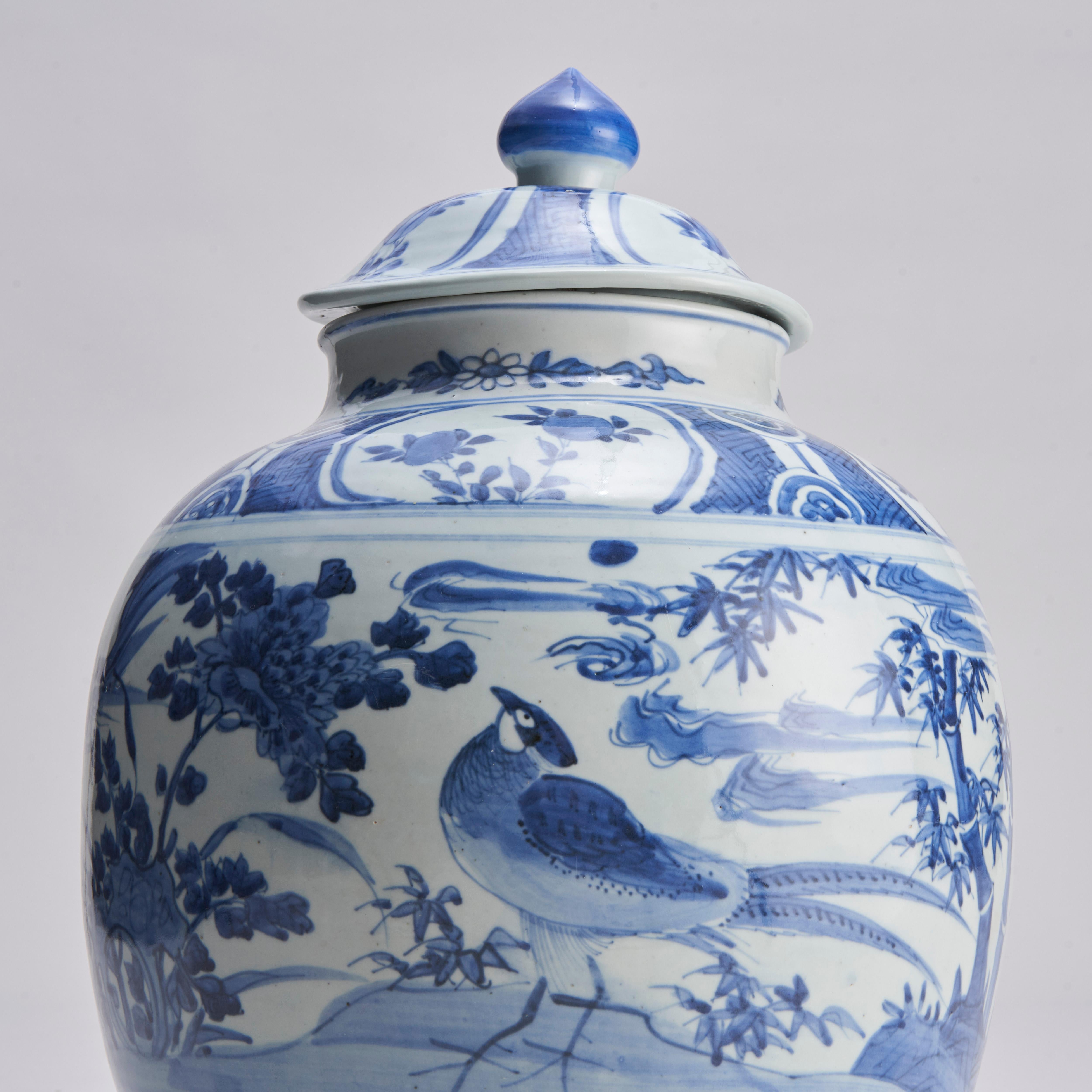 Porcelain A large, early 19th Century Chinese blue and white covered porcelain jar For Sale