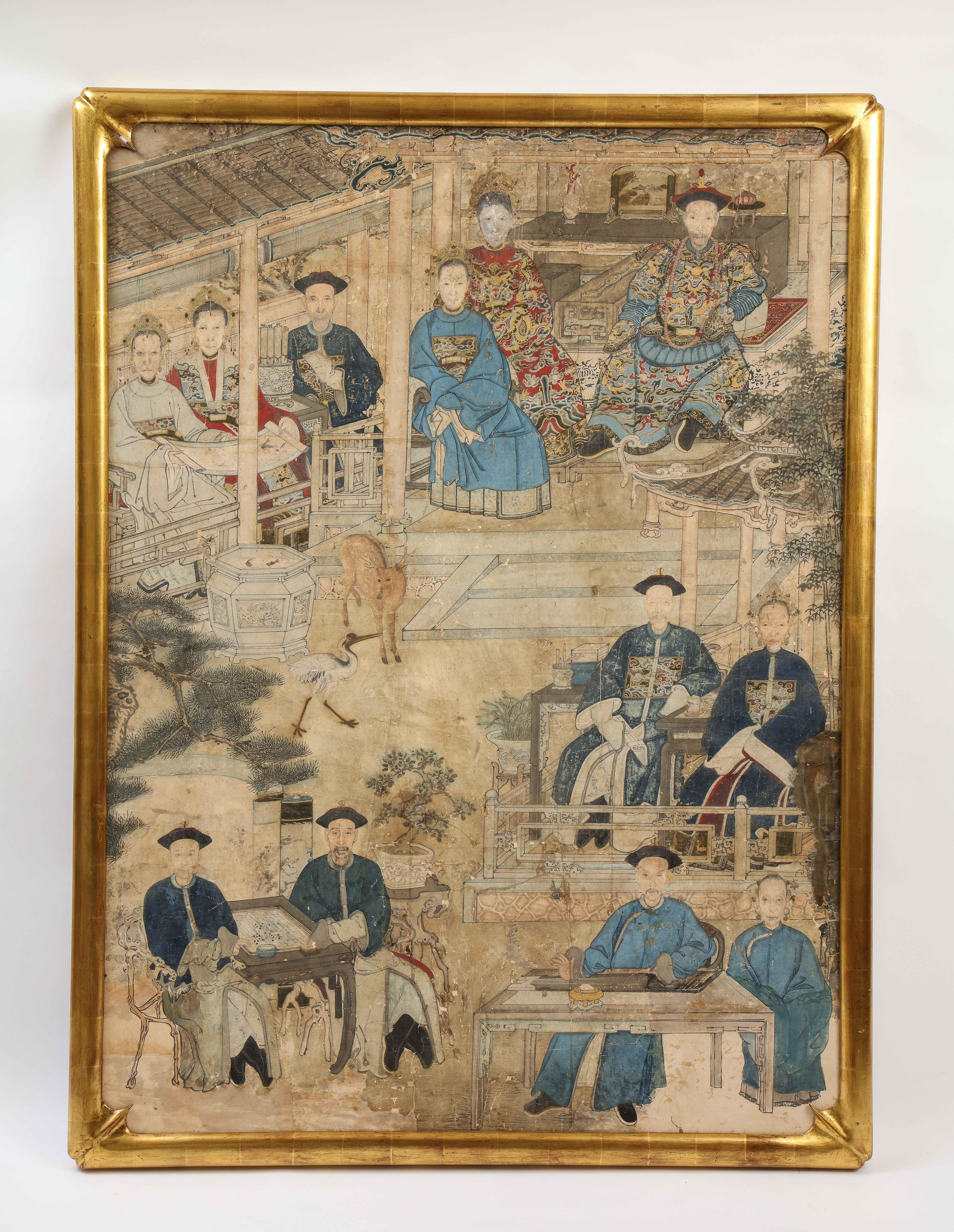 An Incredible and Large Chinese Qing Dynasty (late 19th century) Style Upper Nobility Ancestral Portrait Painting on Paper with a Beautiful 24K giltwood frame. The composition features multiple figures arranged in a tiered format within an